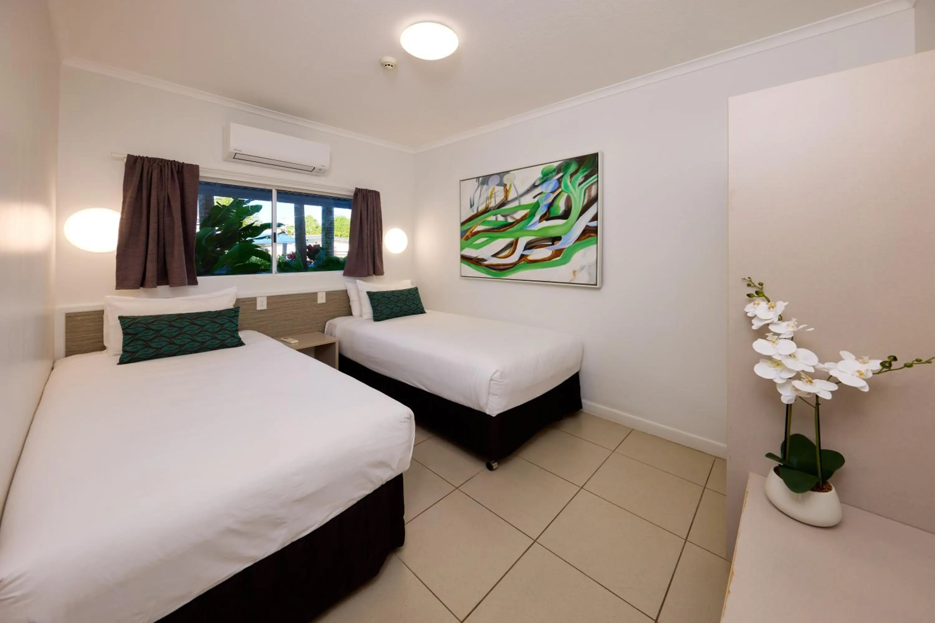 Bed in Castaways Resort & Spa On Mission Beach