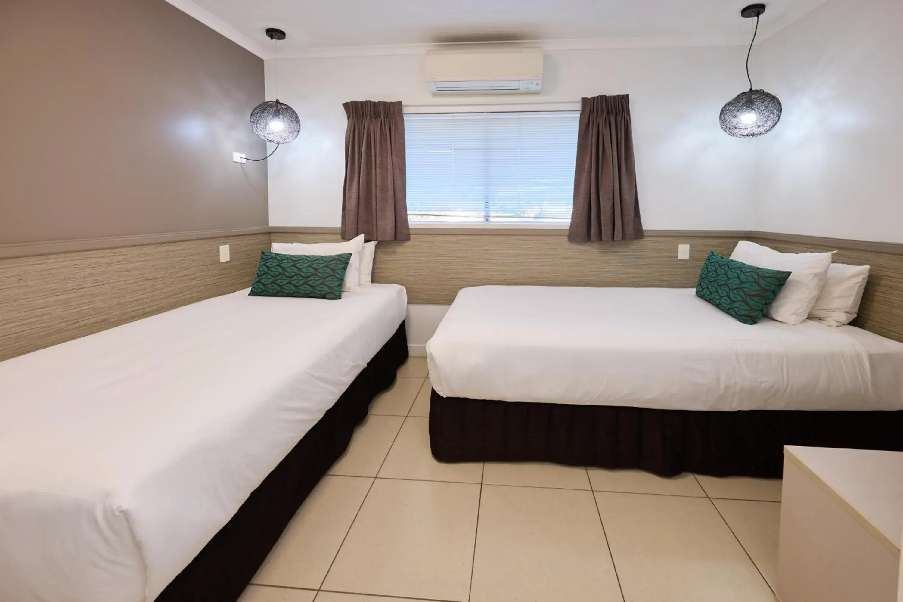 Bed in Castaways Resort & Spa On Mission Beach Bed in Castaways Resort & Spa On Mission Beach