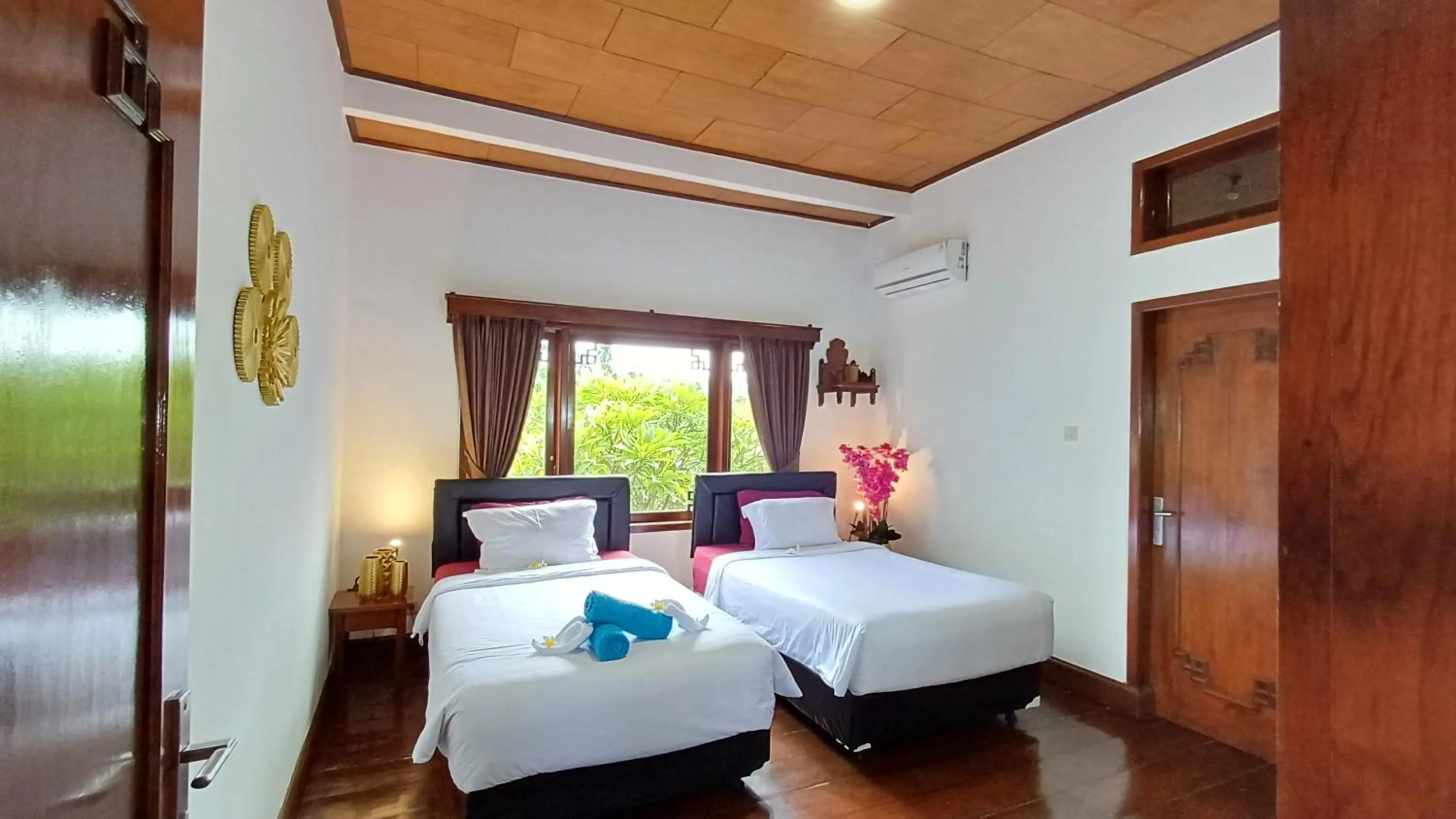 Bed in Balinda Rooms & Villa