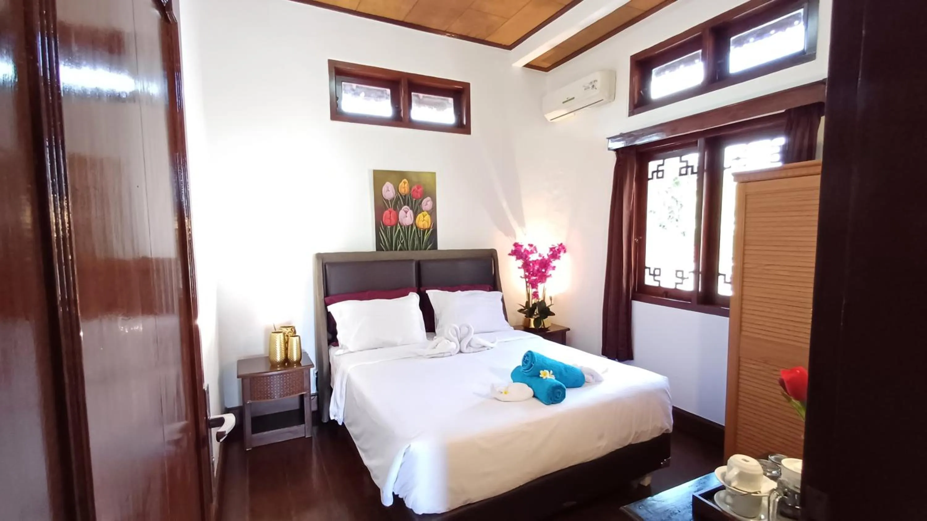 Bed in Balinda Rooms & Villa