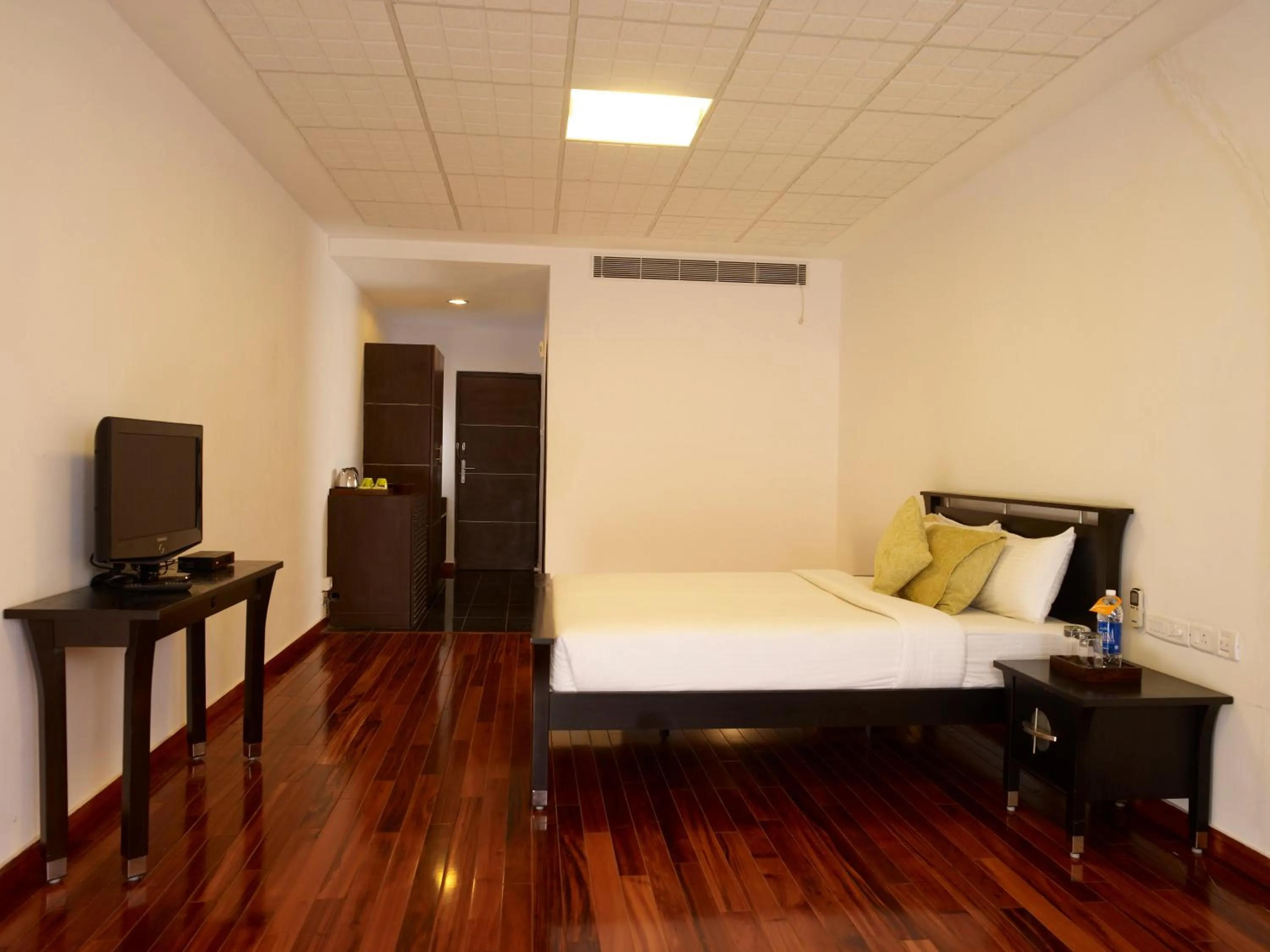 Photo of the whole room, Bed in Vedic Village Sriperumbudur formerly known as Citrus Hotel