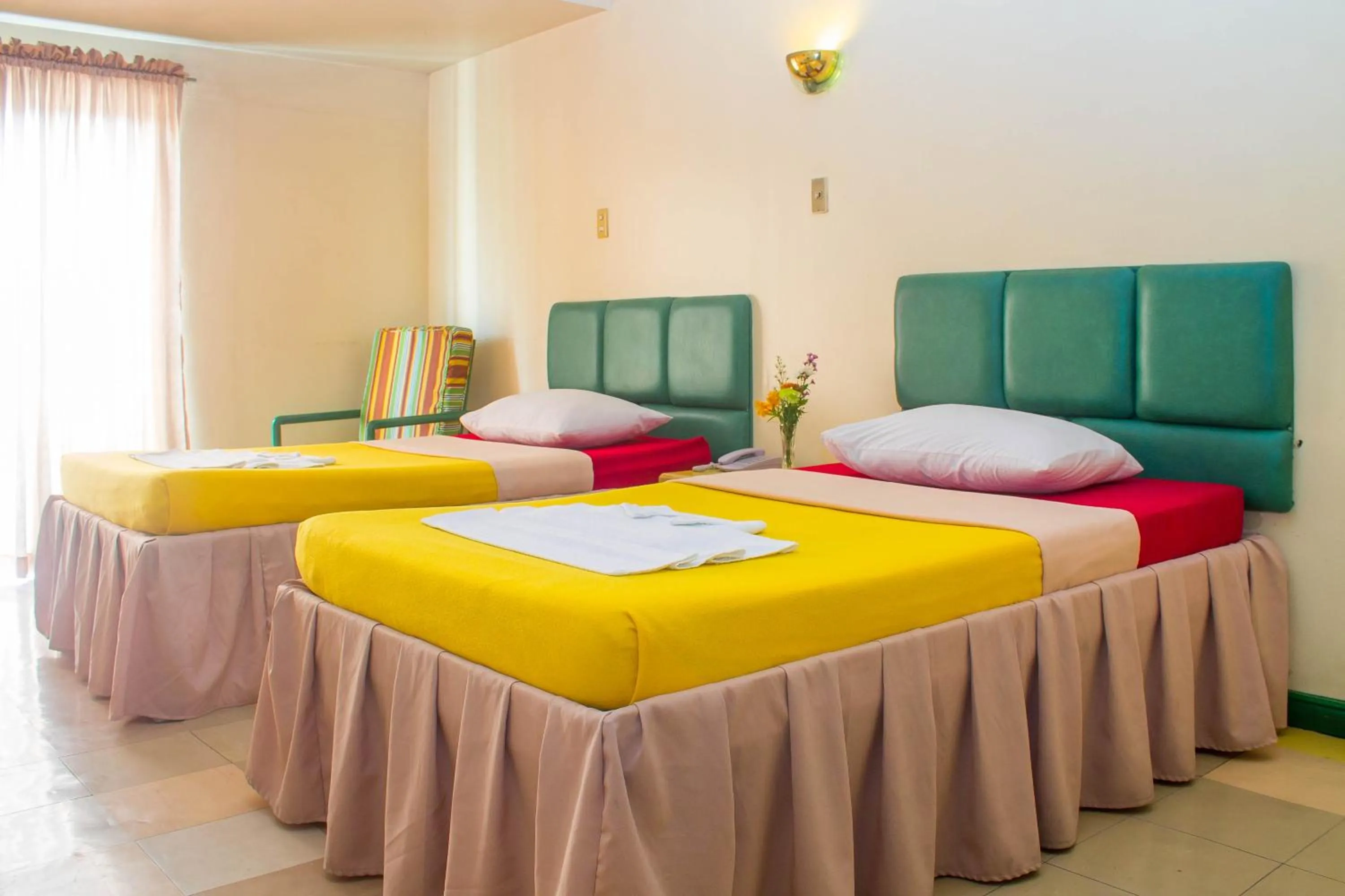 Bed in Benguet Prime Hotel