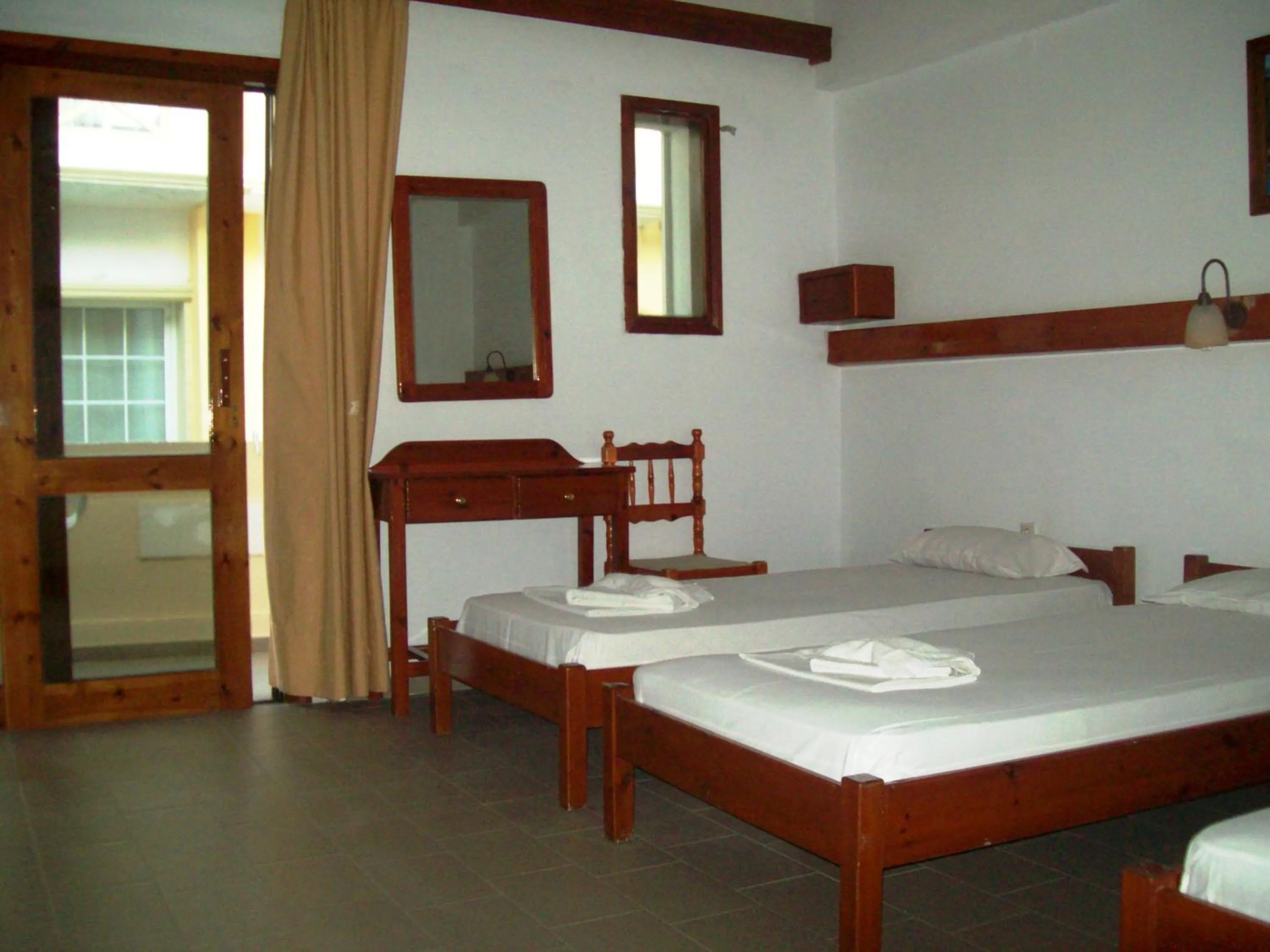 Photo of the whole room, Bed in Kato Stalos Beach