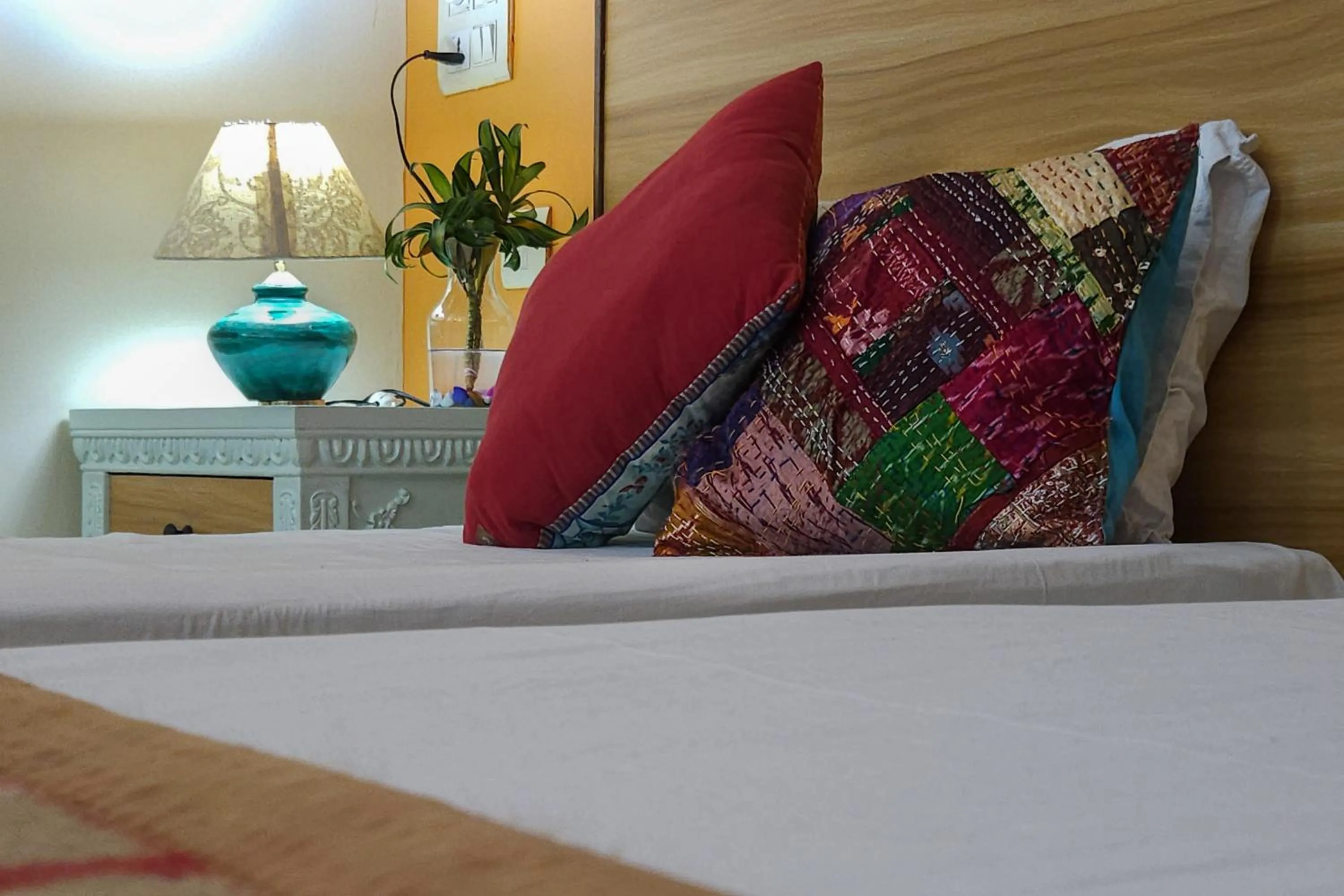 Bed in Prakash Kutir B&B