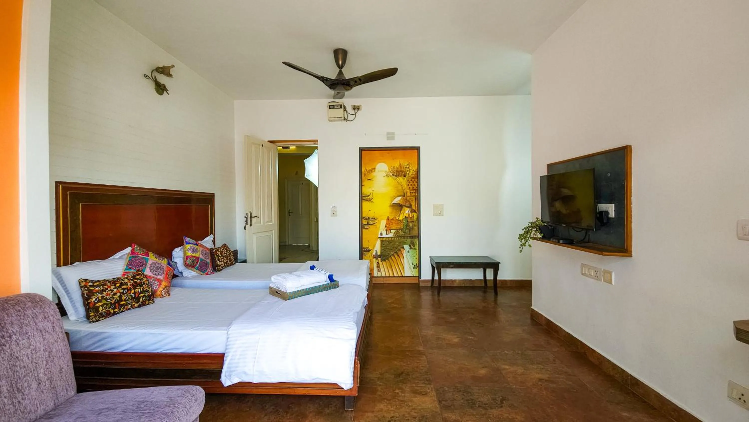 Bed in Prakash Kutir B&B