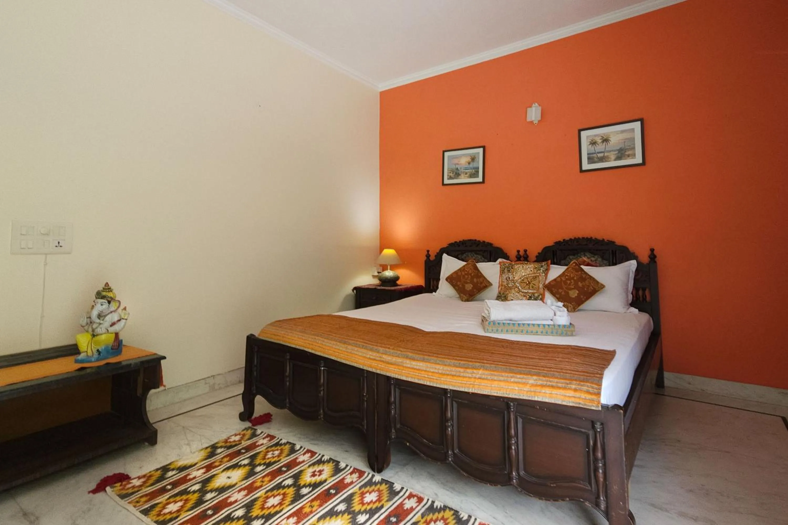 Bed in Prakash Kutir B&B