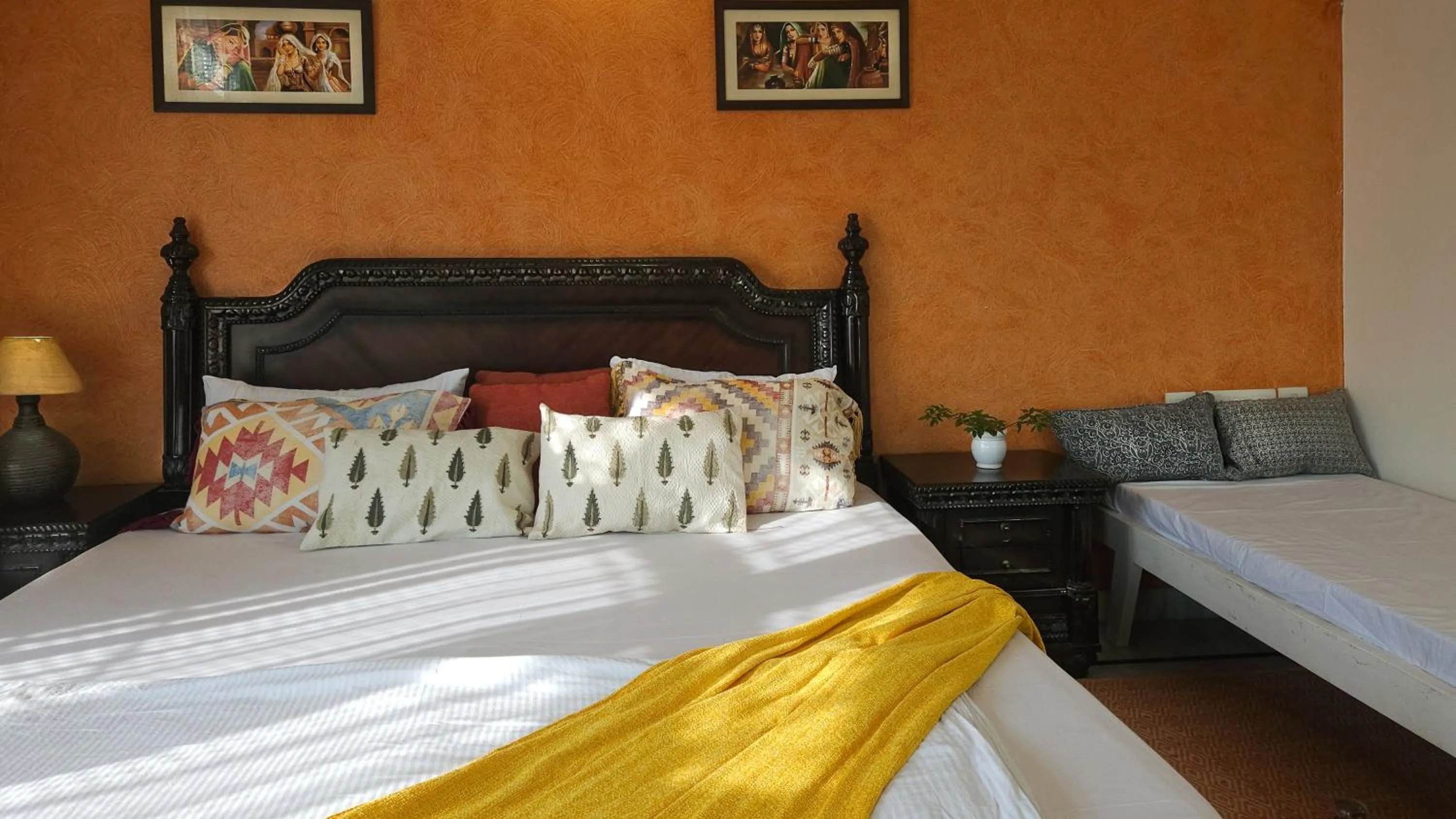 Bed in Prakash Kutir B&B