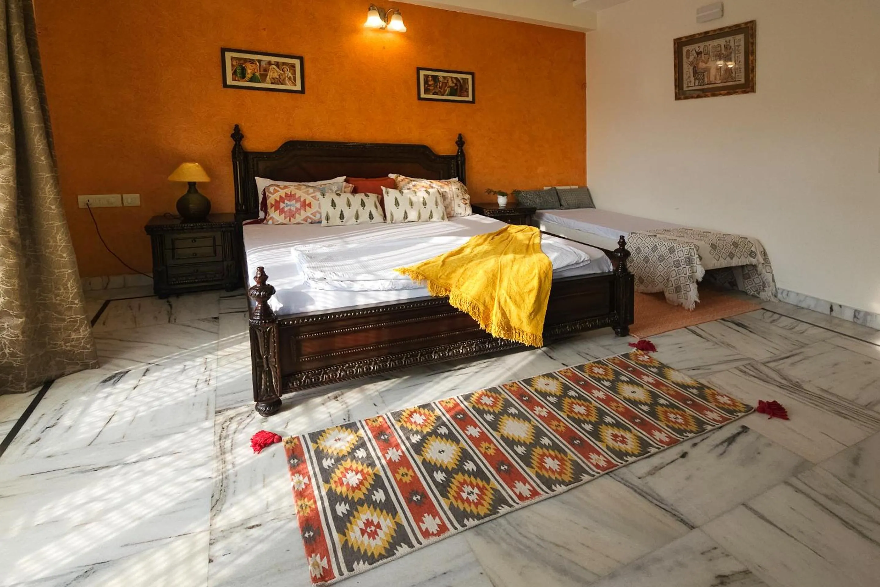 Bed in Prakash Kutir B&B