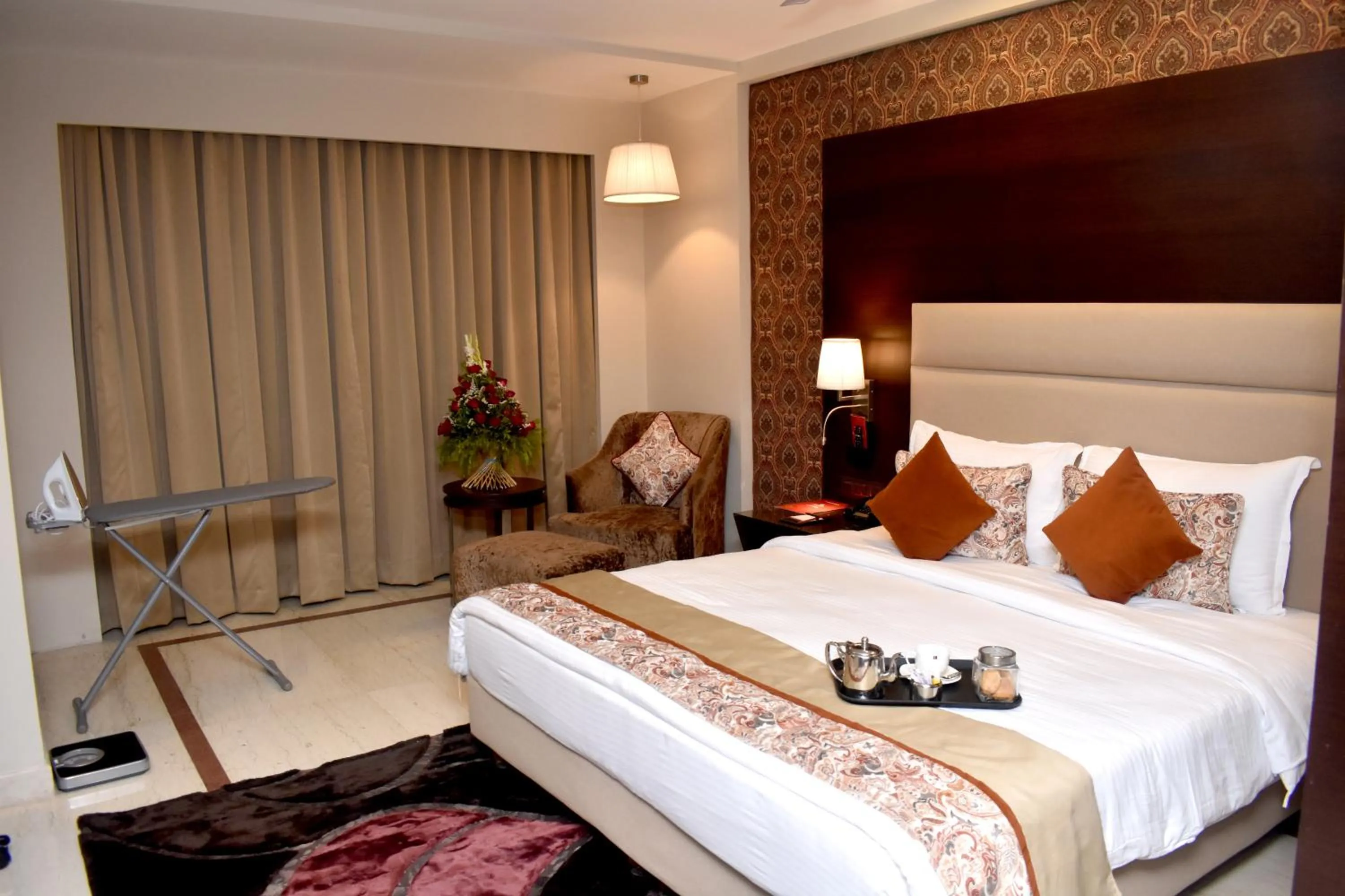 Photo of the whole room, Bed in Lords Plaza Surat