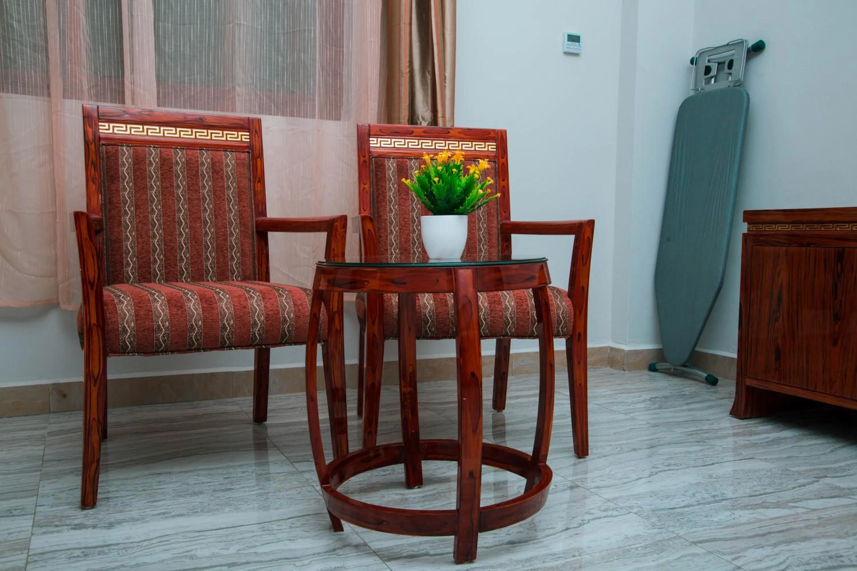 Seating area in Tiffany Diamond Hotels LTD - Makunganya