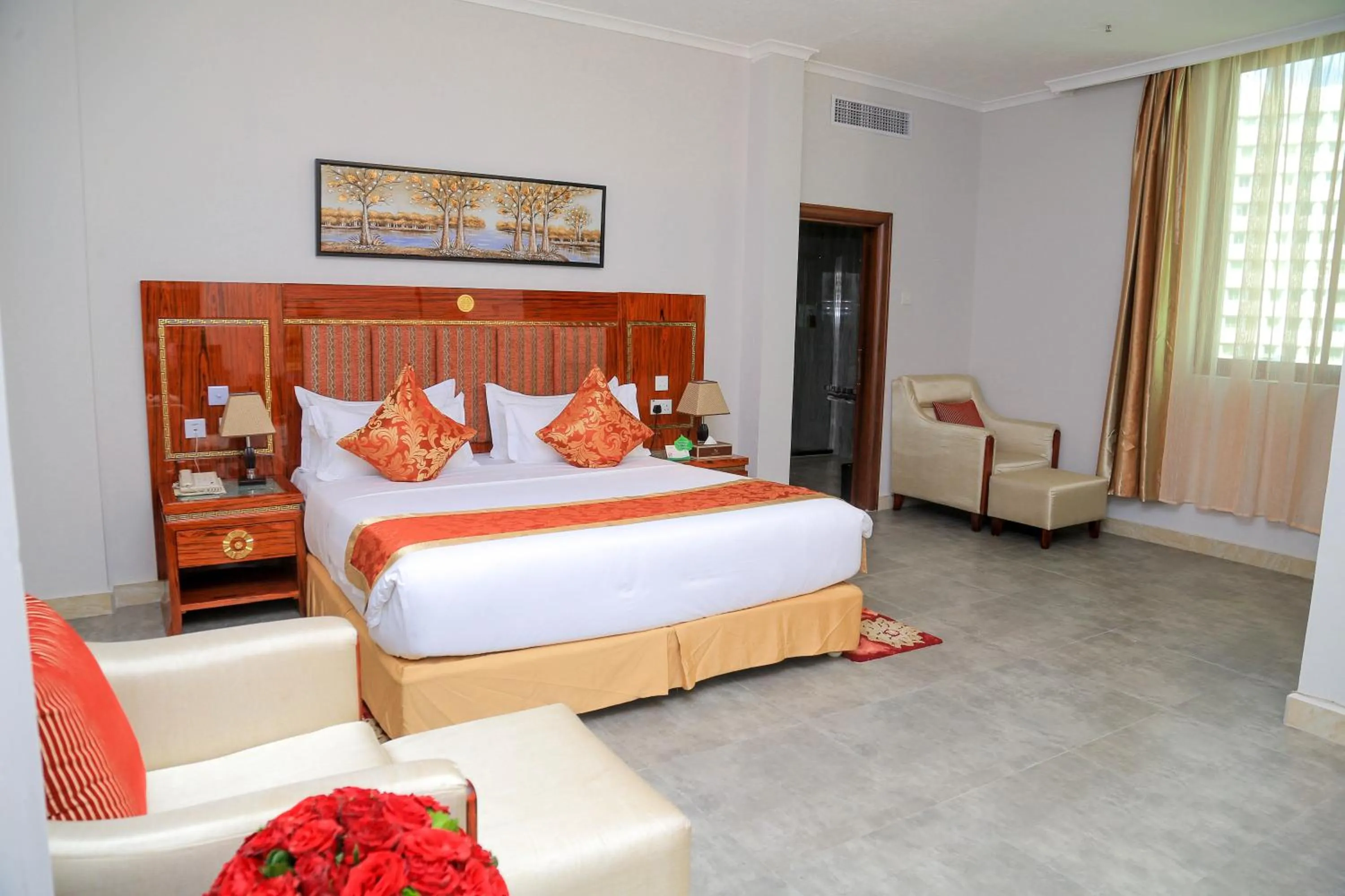 Photo of the whole room, Bed in Tiffany Diamond Hotels LTD - Makunganya