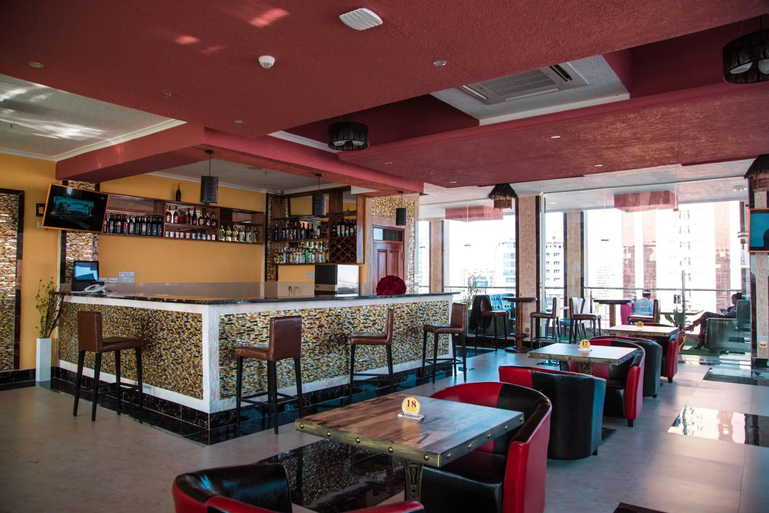 Lounge or bar in Tiffany Diamond Hotels LTD - Makunganya Lounge or bar in Tiffany Diamond Hotels LTD - Makunganya