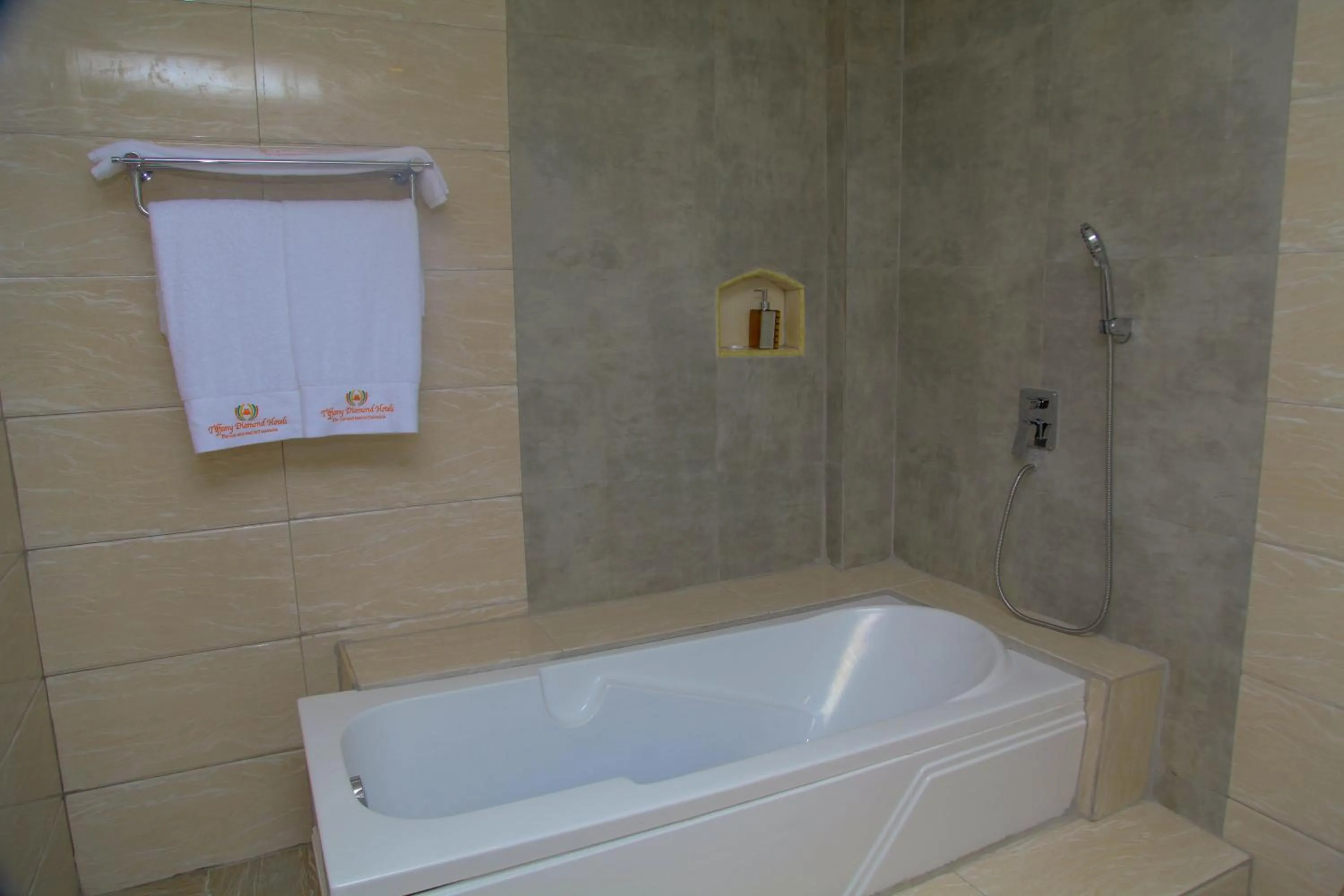 Bathroom in Tiffany Diamond Hotels LTD - Makunganya