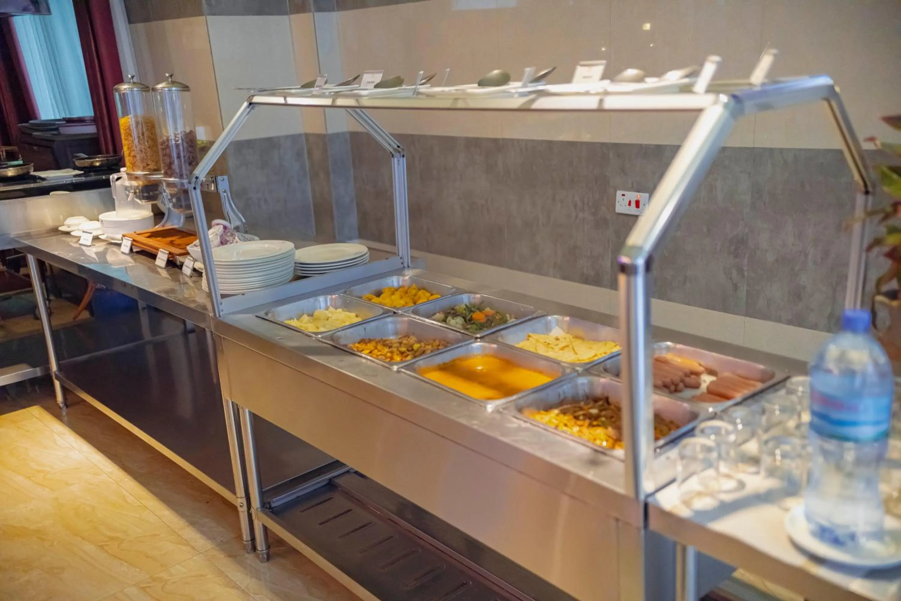 Buffet breakfast in Tiffany Diamond Hotels LTD - Makunganya