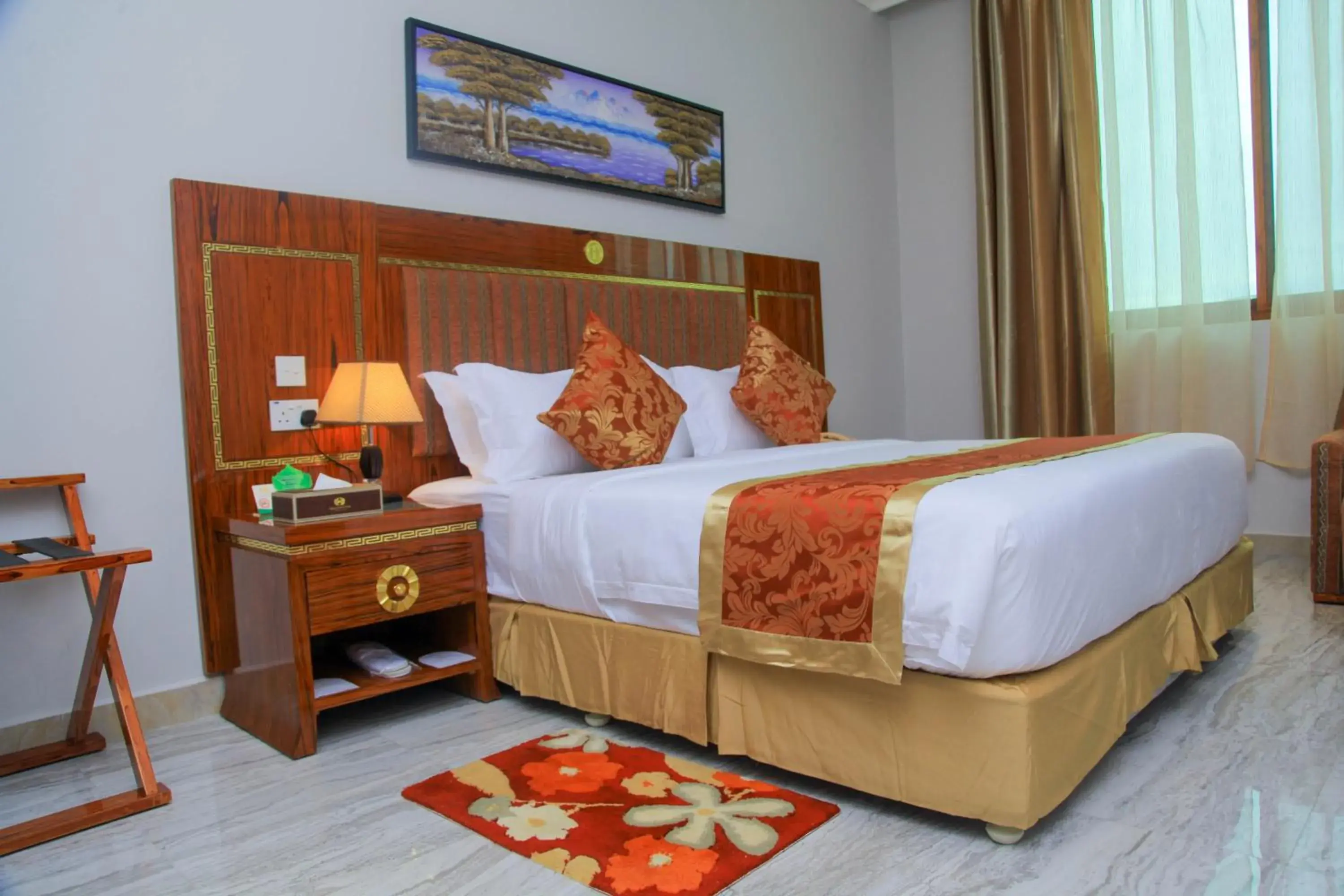 Bed in Tiffany Diamond Hotels LTD - Makunganya Bed in Tiffany Diamond Hotels LTD - Makunganya