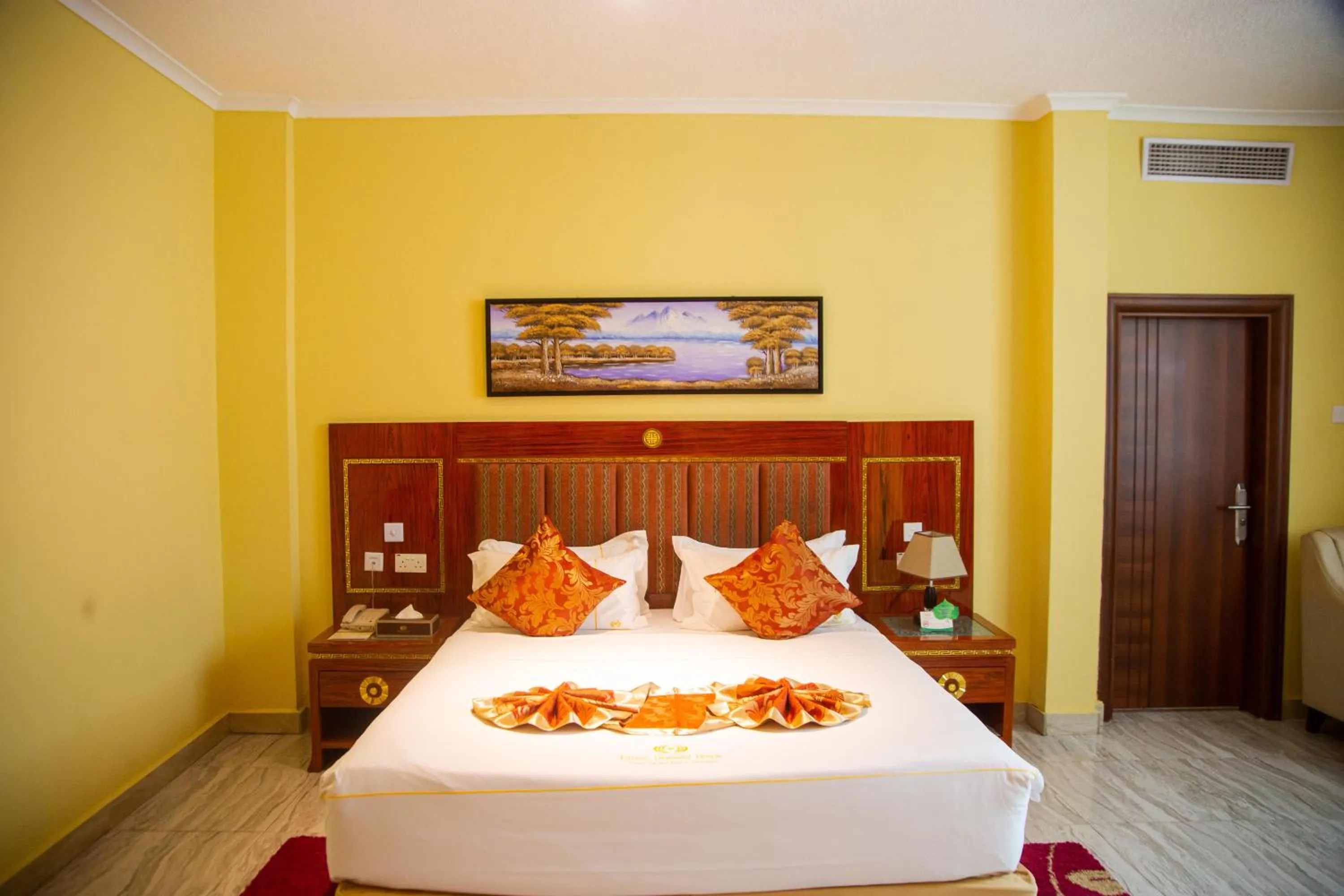 Bed in Tiffany Diamond Hotels LTD - Makunganya