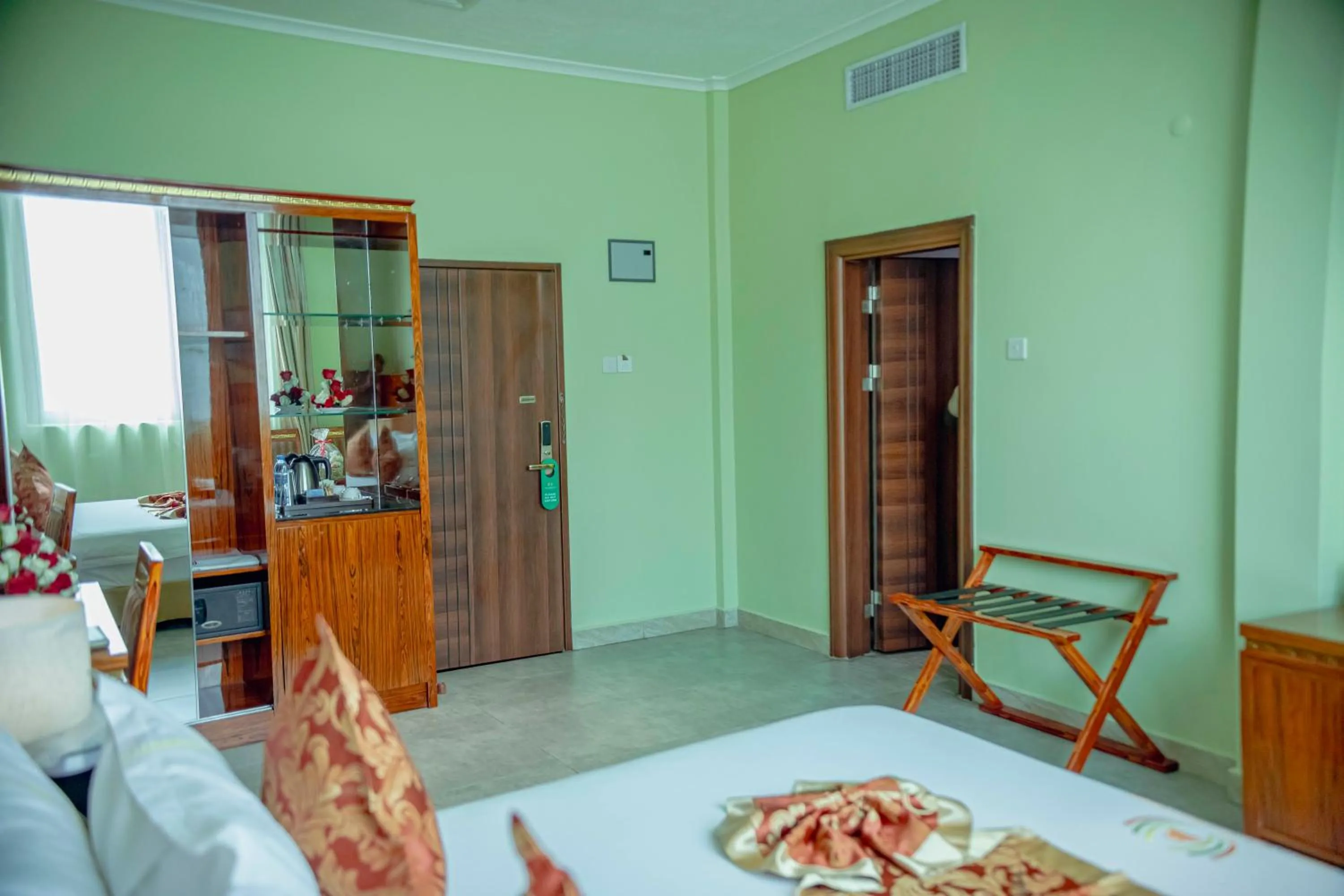 Bed in Tiffany Diamond Hotels LTD - Makunganya