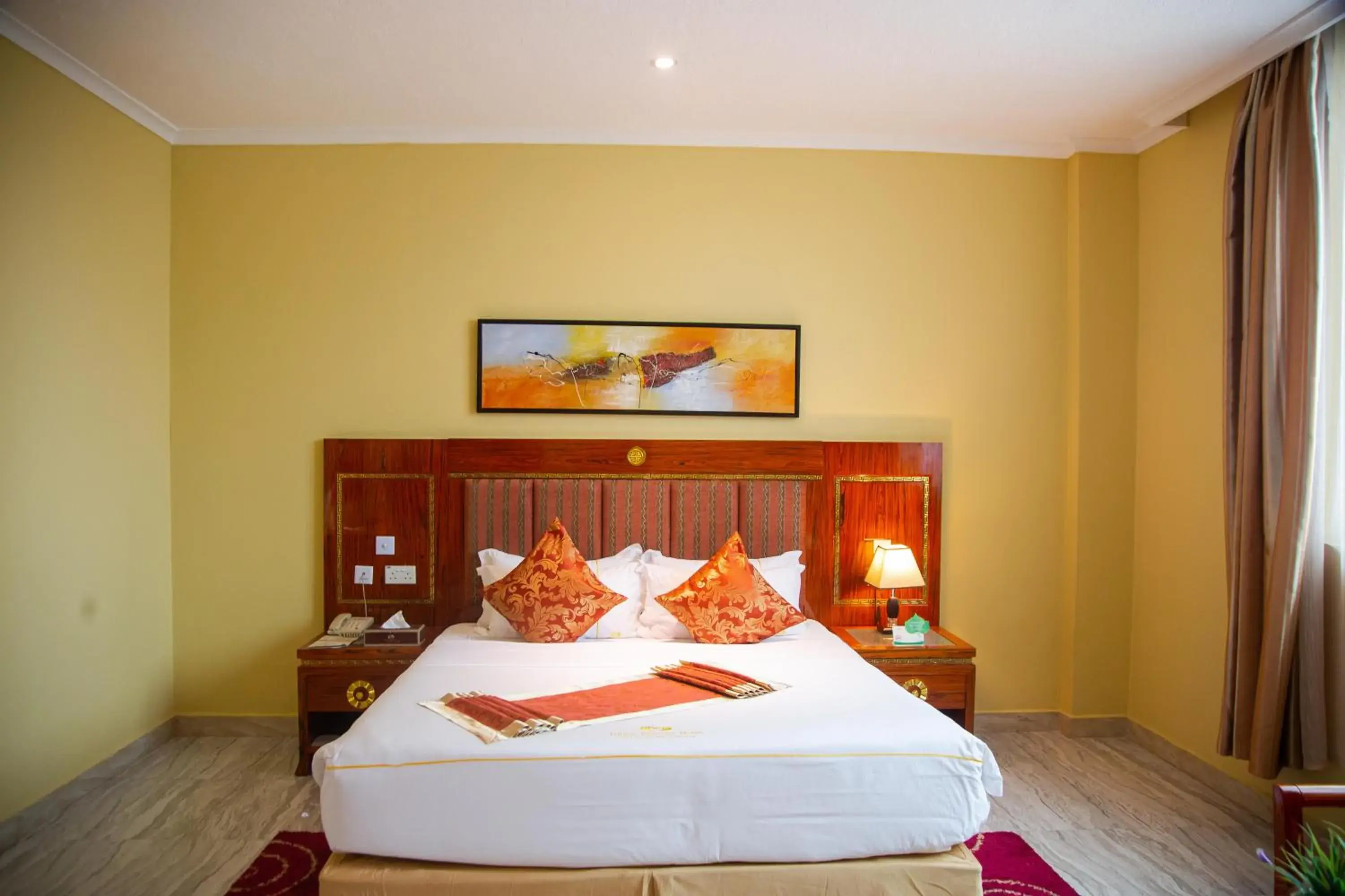 Bed in Tiffany Diamond Hotels LTD - Makunganya Bed in Tiffany Diamond Hotels LTD - Makunganya
