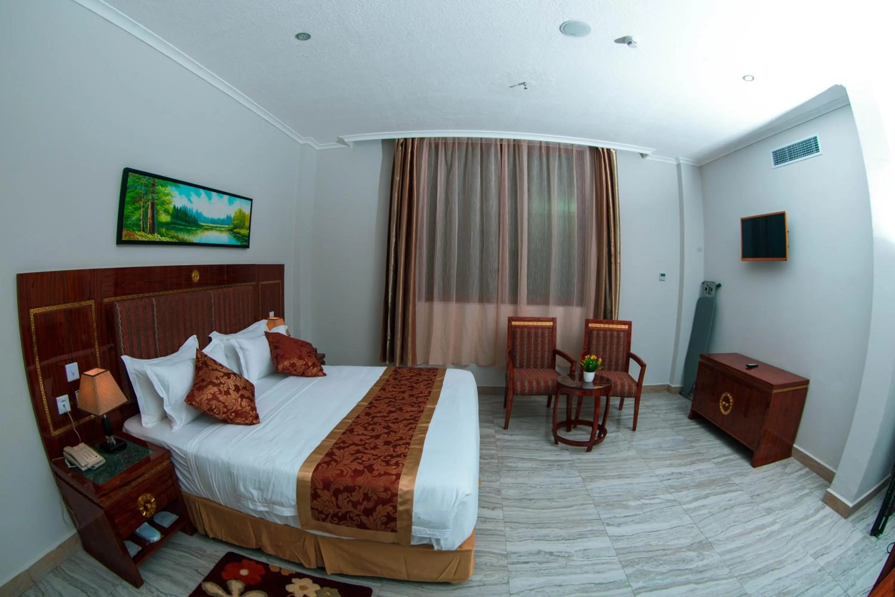 Photo of the whole room, Bed in Tiffany Diamond Hotels LTD - Makunganya