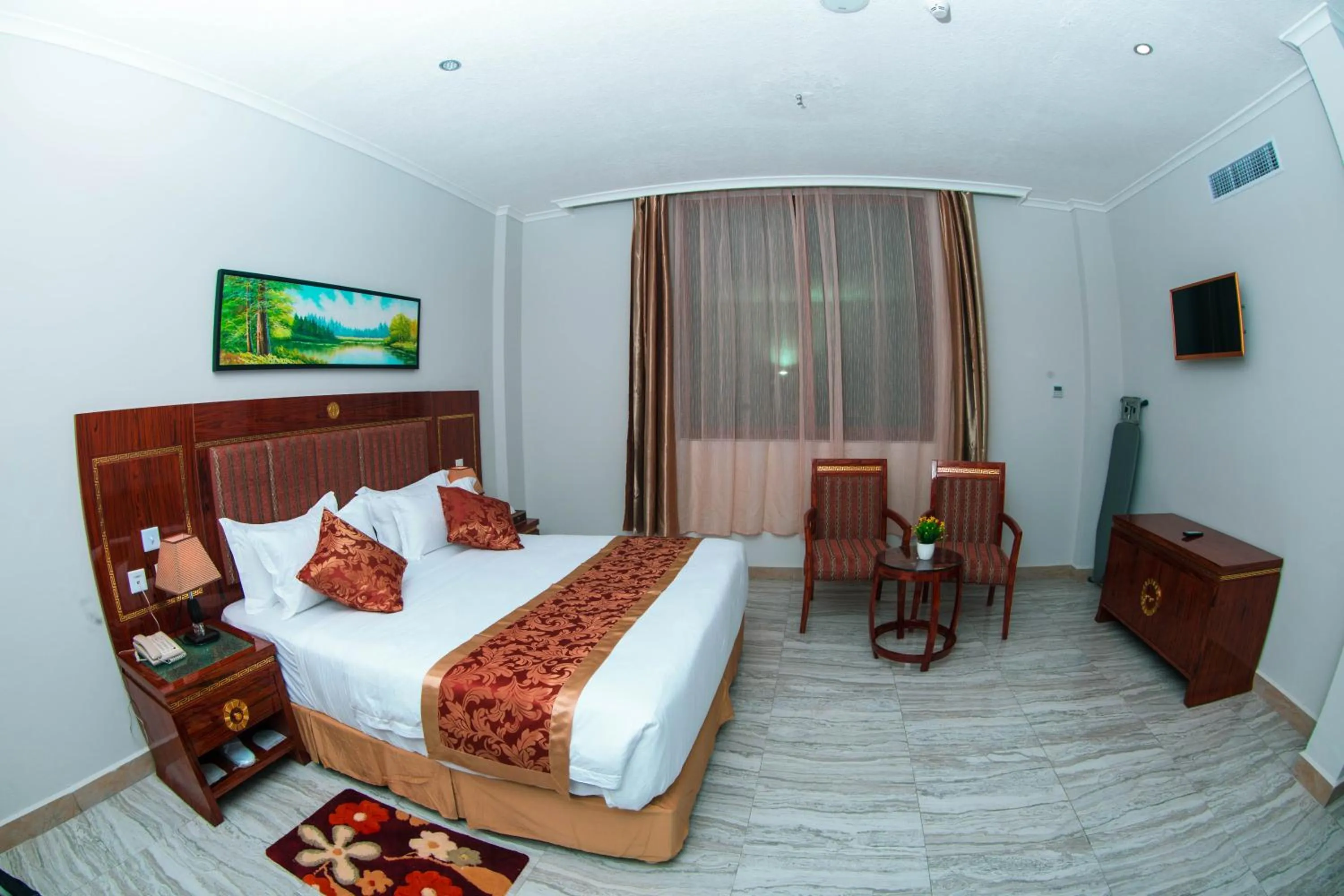 Photo of the whole room, Bed in Tiffany Diamond Hotels LTD - Makunganya
