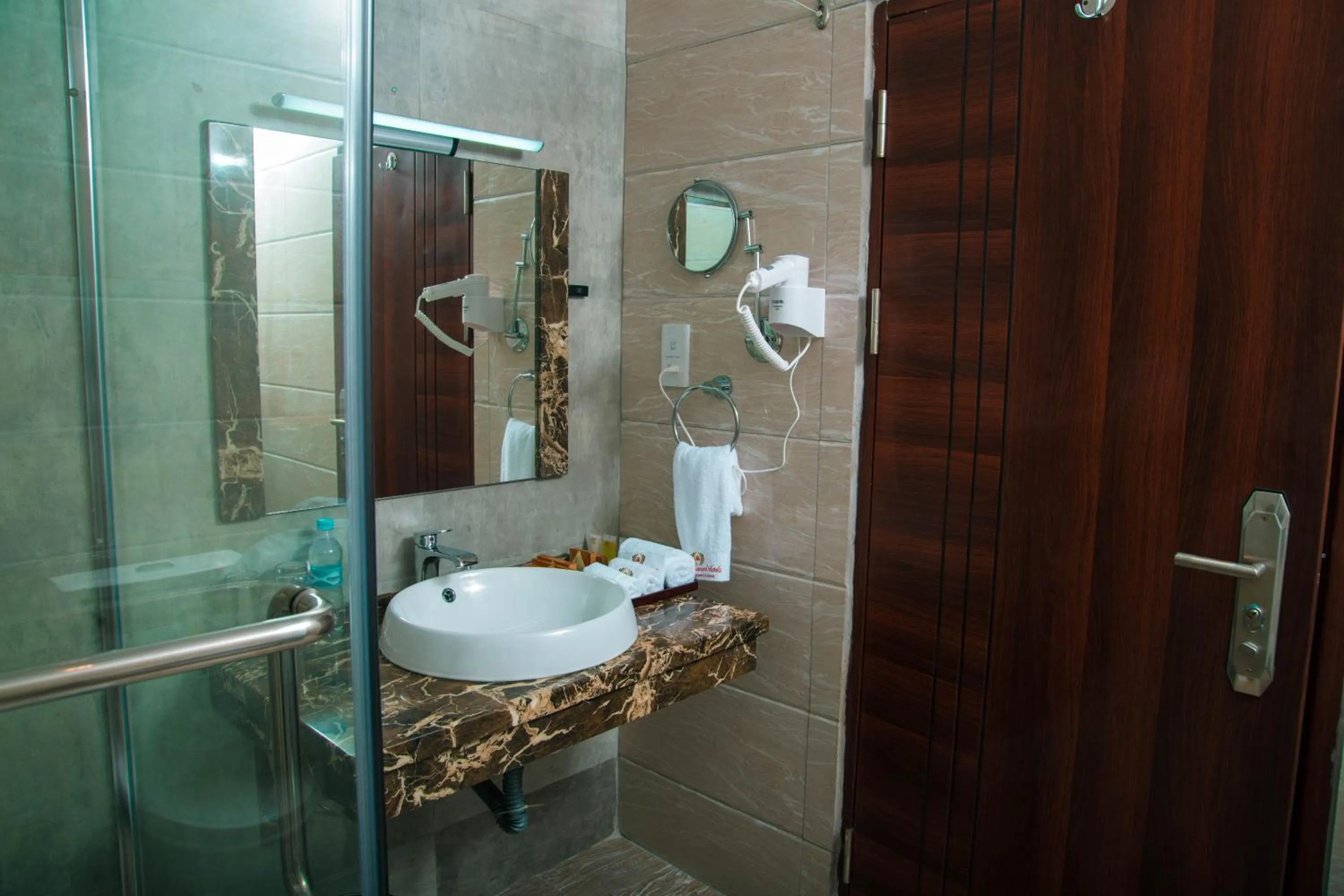 Bathroom in Tiffany Diamond Hotels LTD - Makunganya