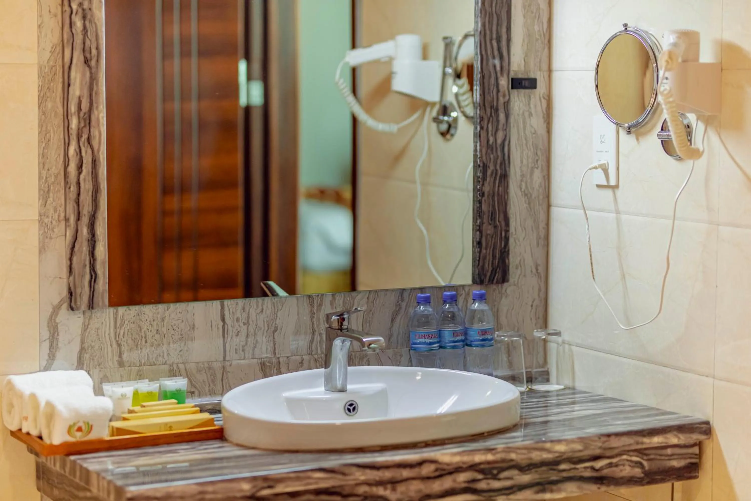 Bathroom in Tiffany Diamond Hotels LTD - Makunganya