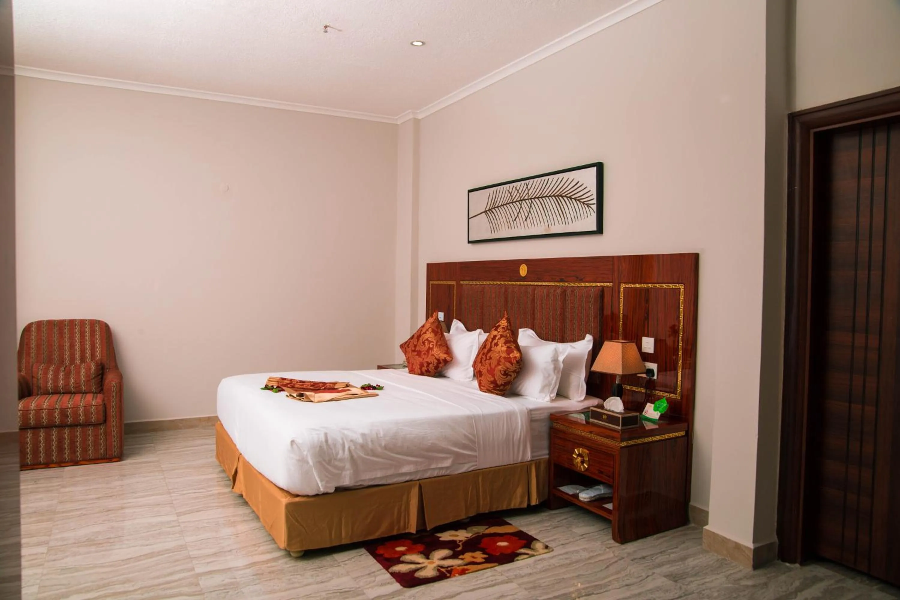 Bed in Tiffany Diamond Hotels LTD - Makunganya