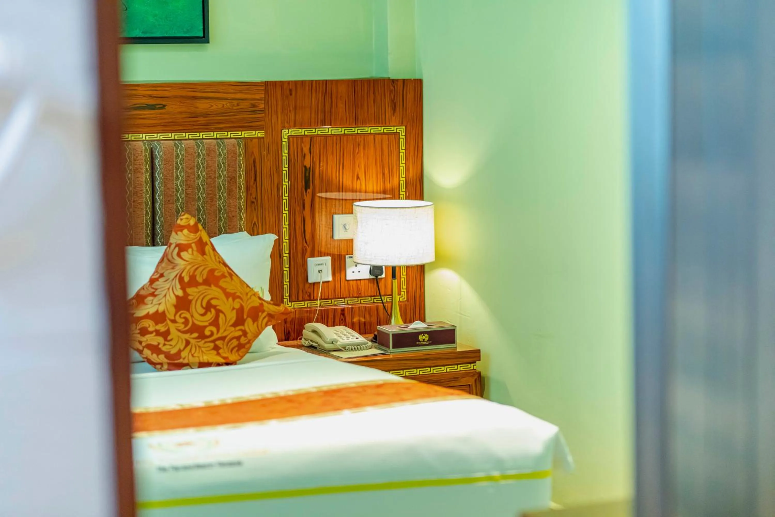 Bedroom, Bed in Tiffany Diamond Hotels LTD - Makunganya