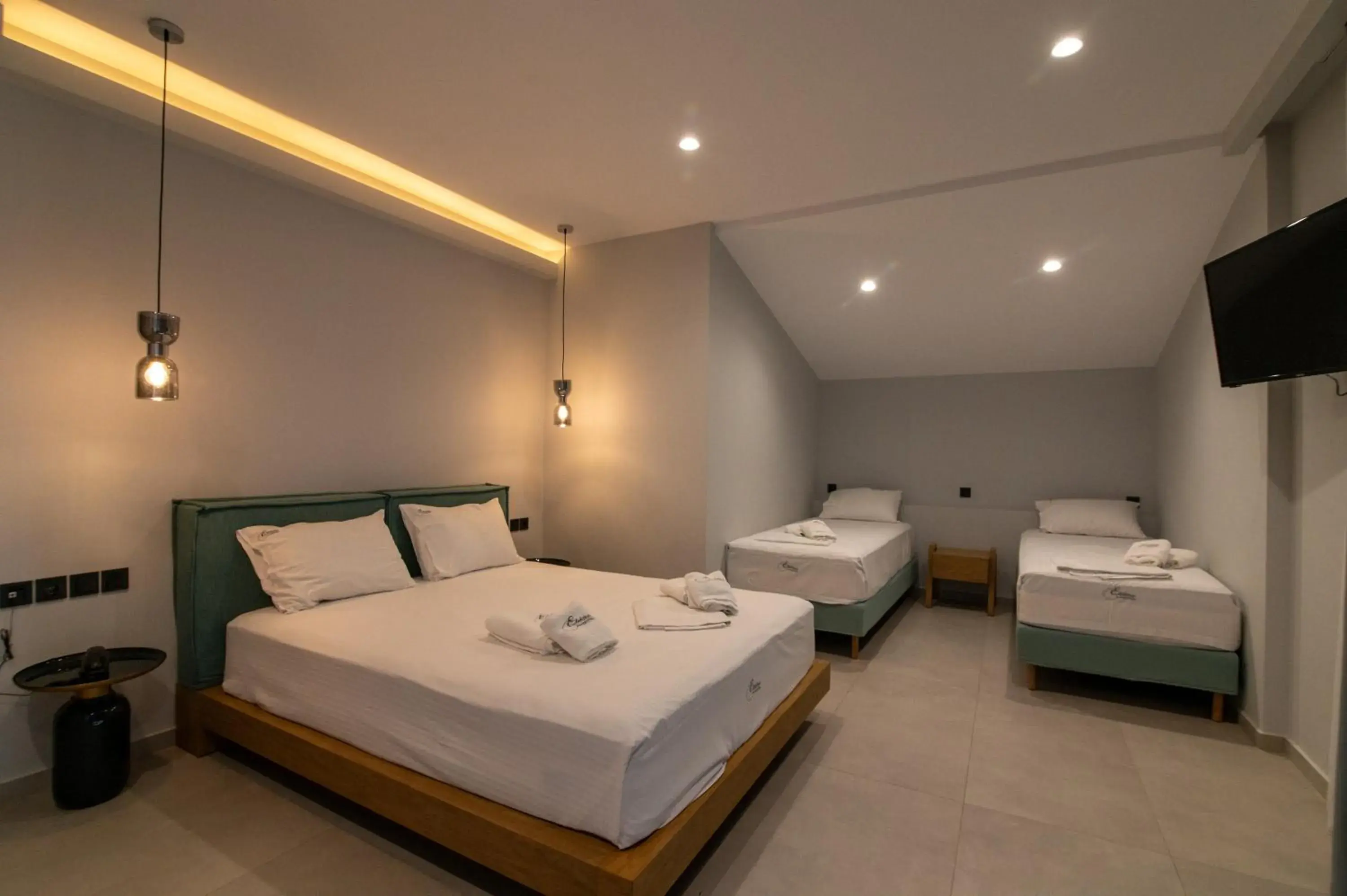 Deluxe Quadruple Room in Elektra Hotel Deluxe Quadruple Room in Elektra Hotel