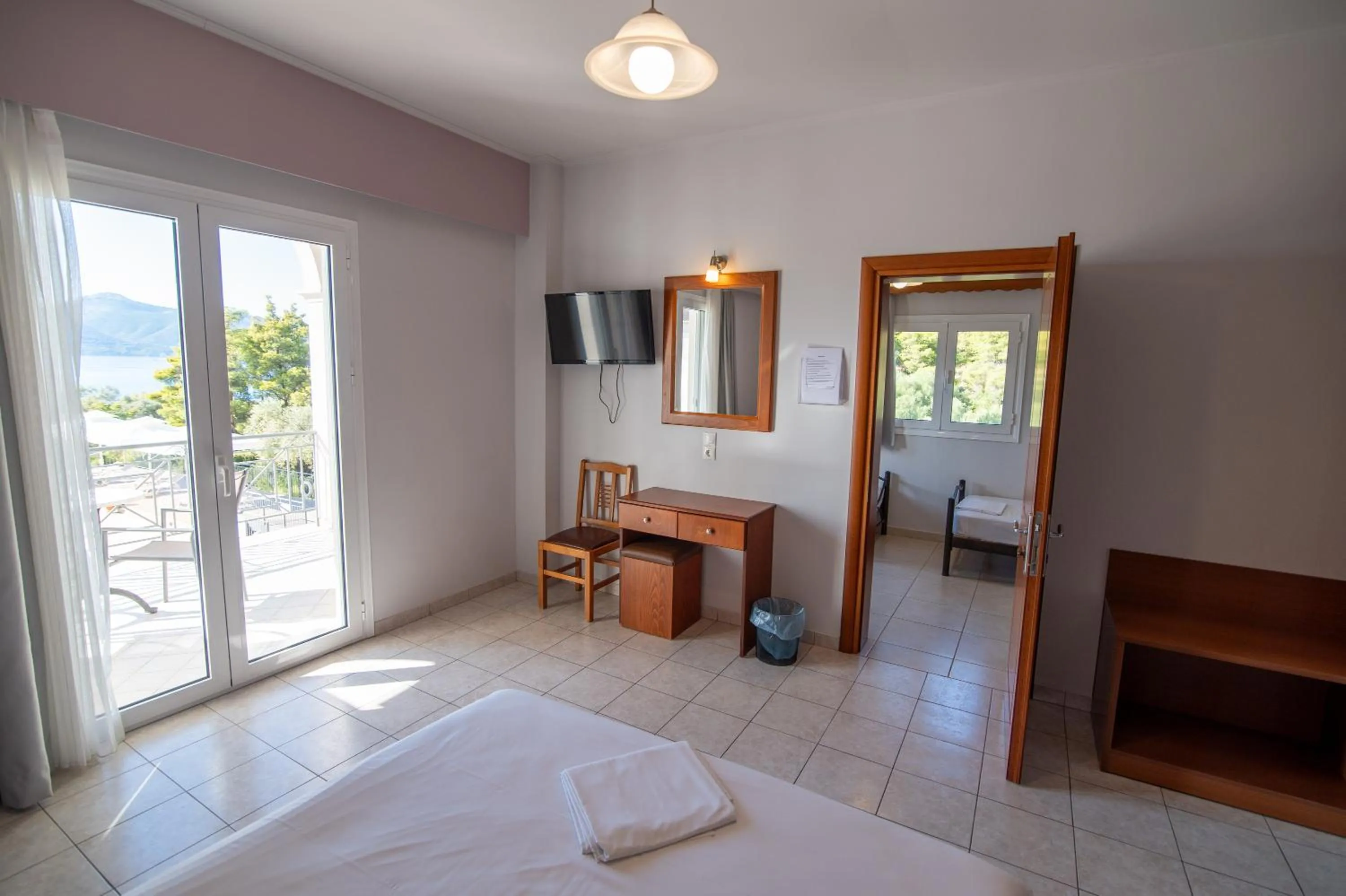 Bed in Elektra Hotel