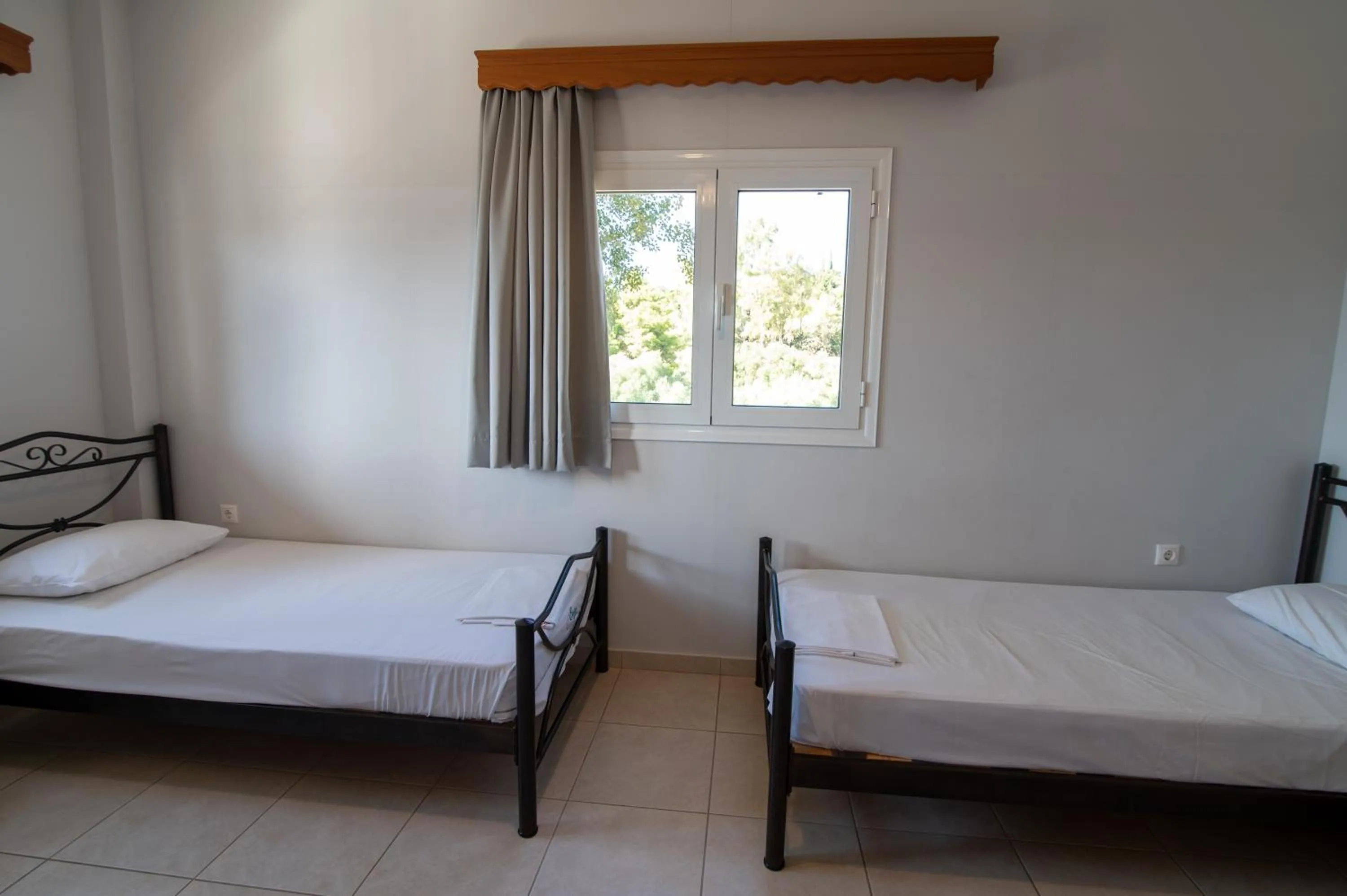 Bed in Elektra Hotel