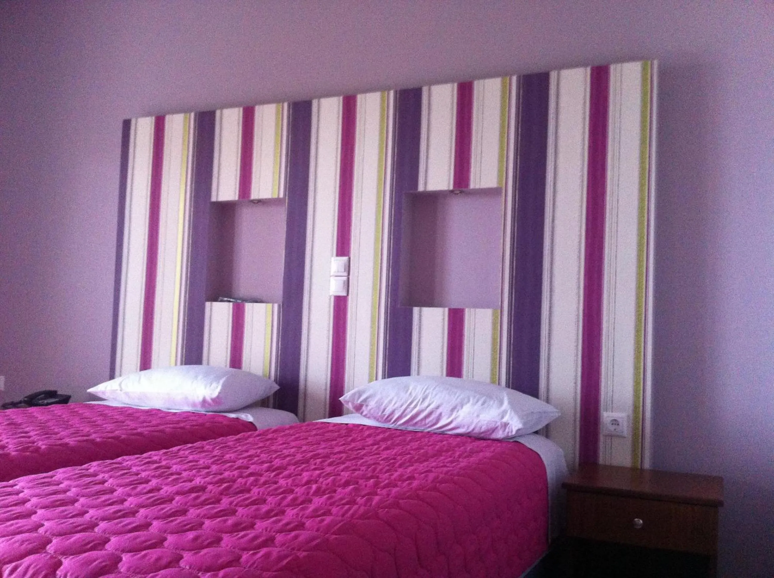 Bed in Elektra Hotel