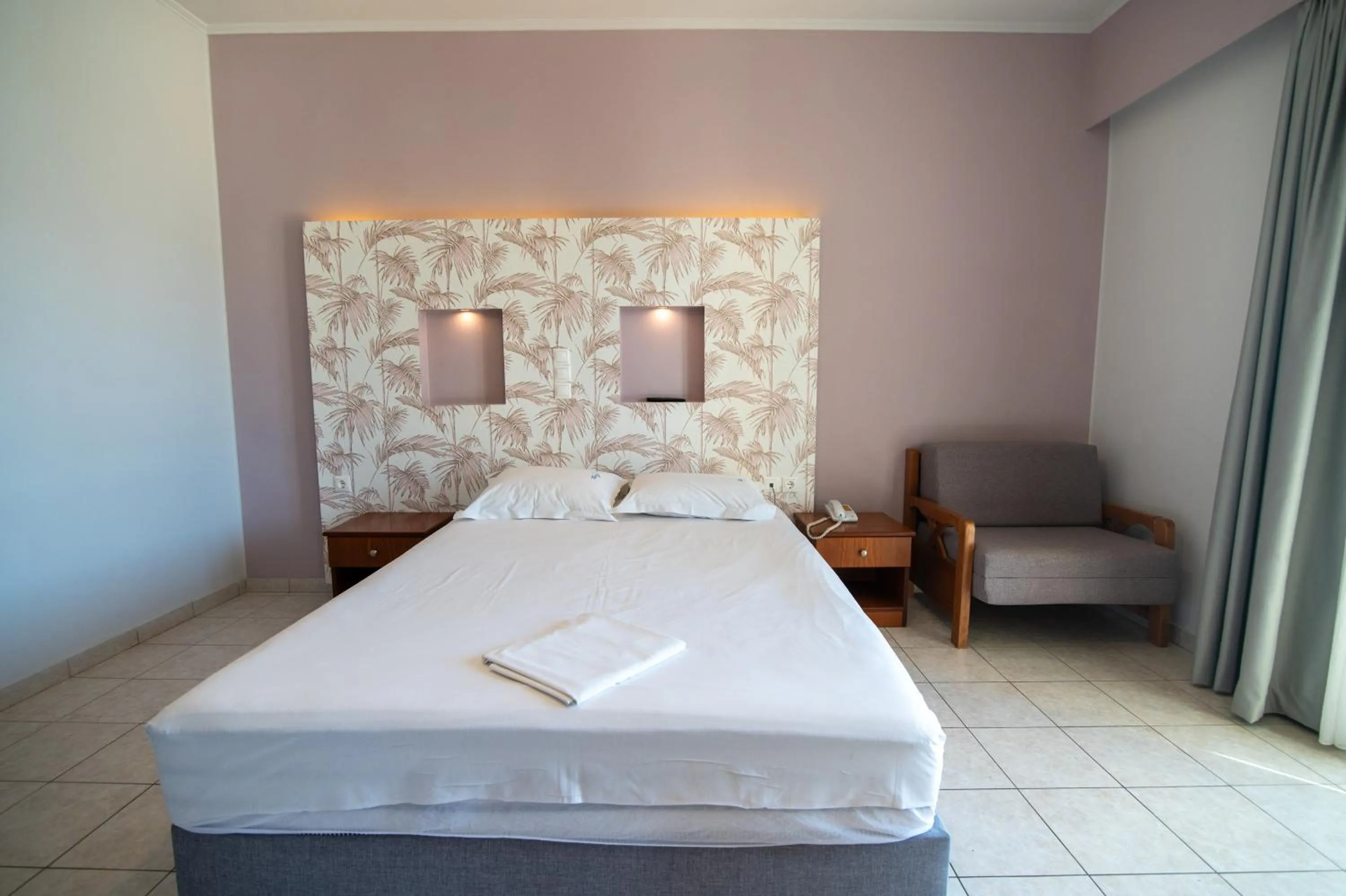 Bed in Elektra Hotel