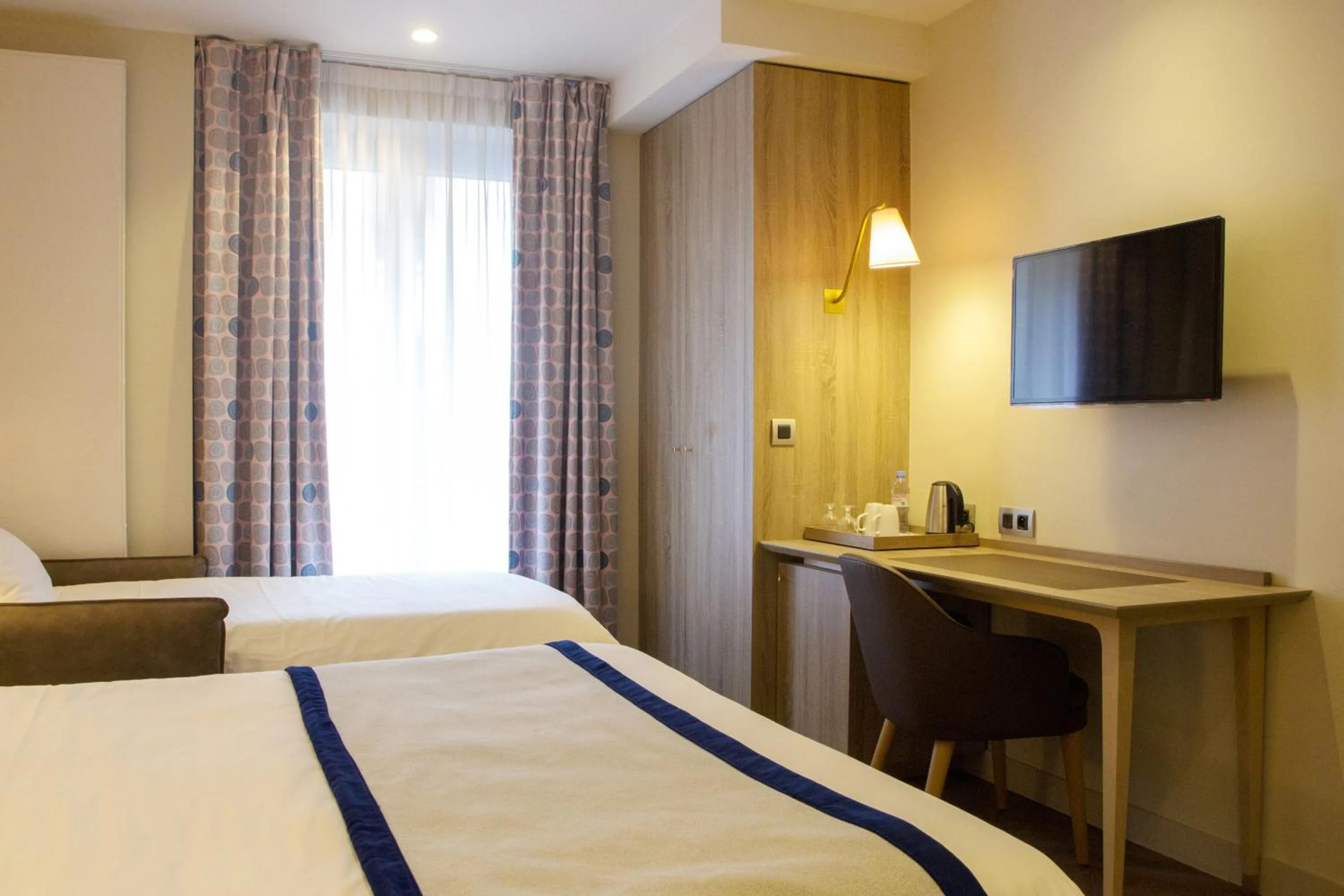 Bed in Hôtel de Sévigné