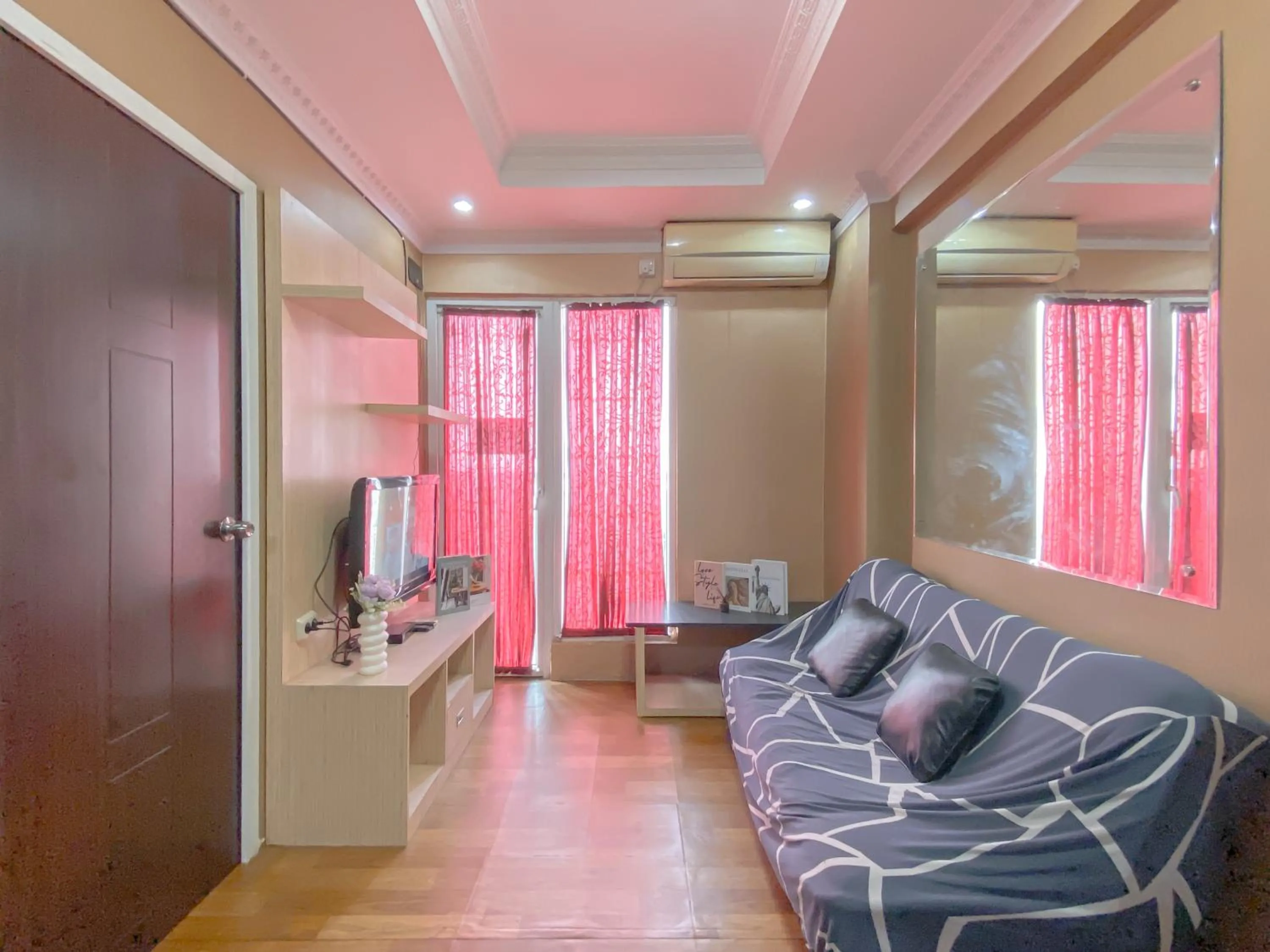 Relaxing 2BR with Pool View Mutiara Bekasi Apartment By Travelio