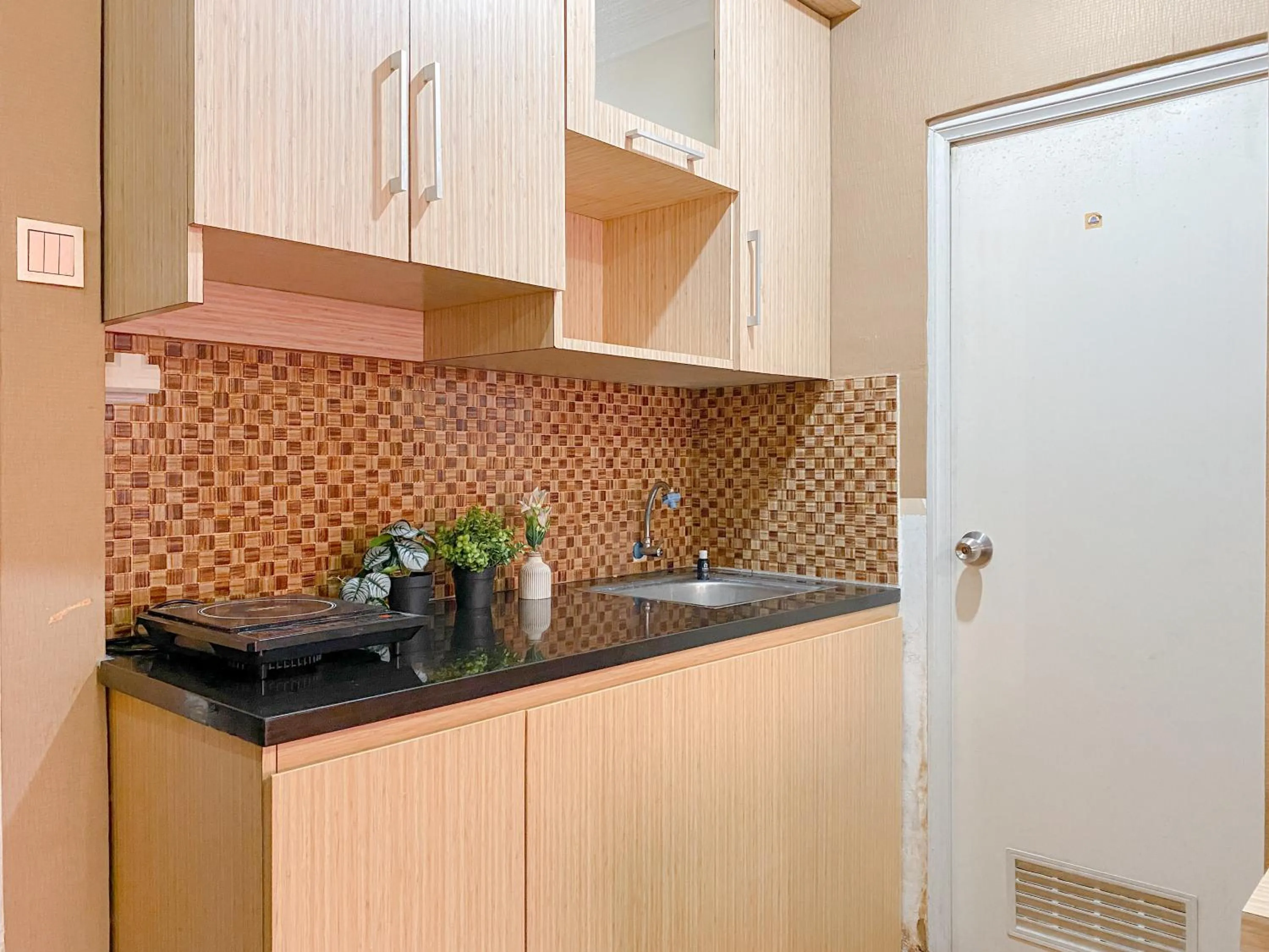 Relaxing 2BR with Pool View Mutiara Bekasi Apartment By Travelio