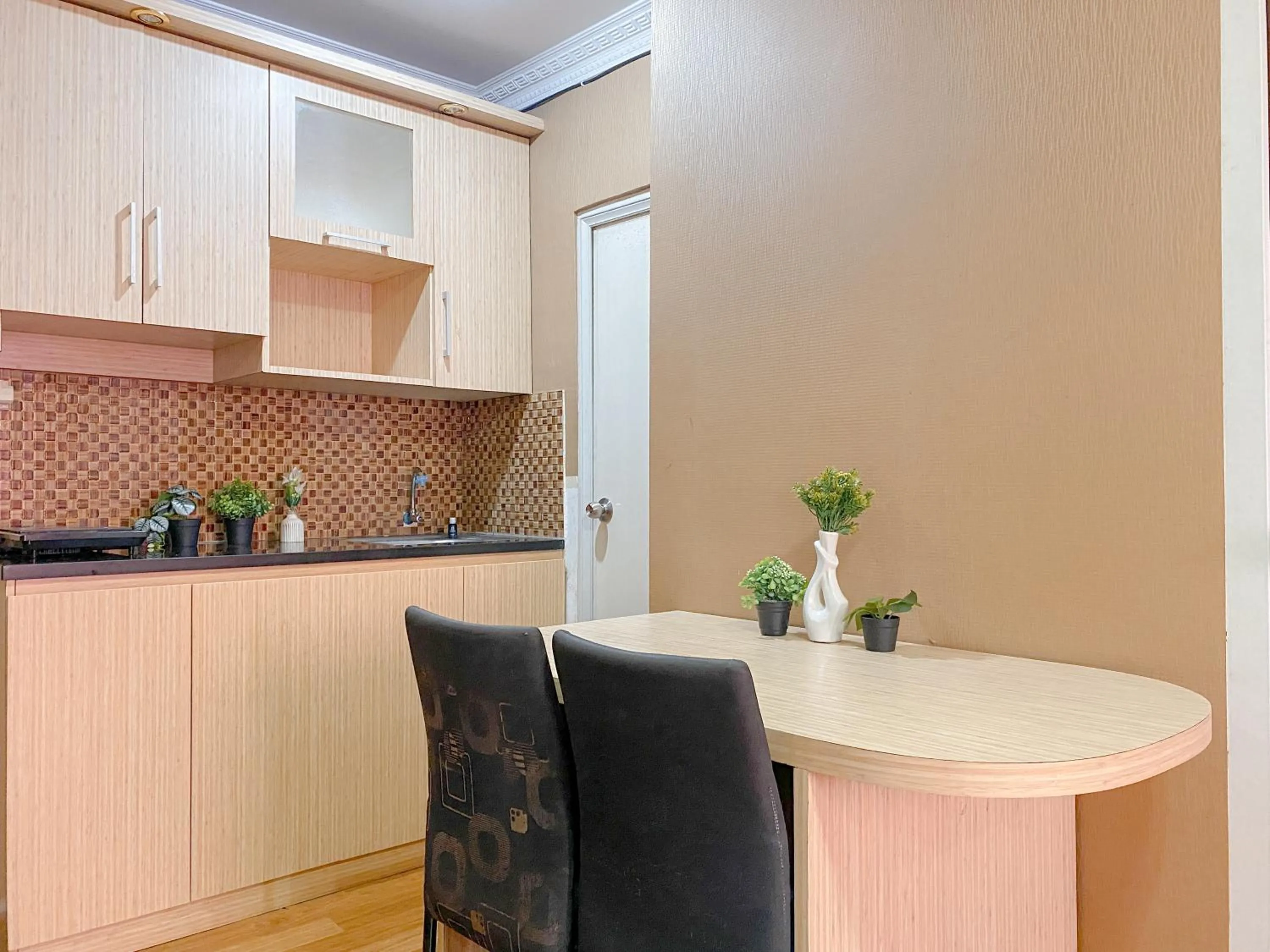 Relaxing 2BR with Pool View Mutiara Bekasi Apartment By Travelio