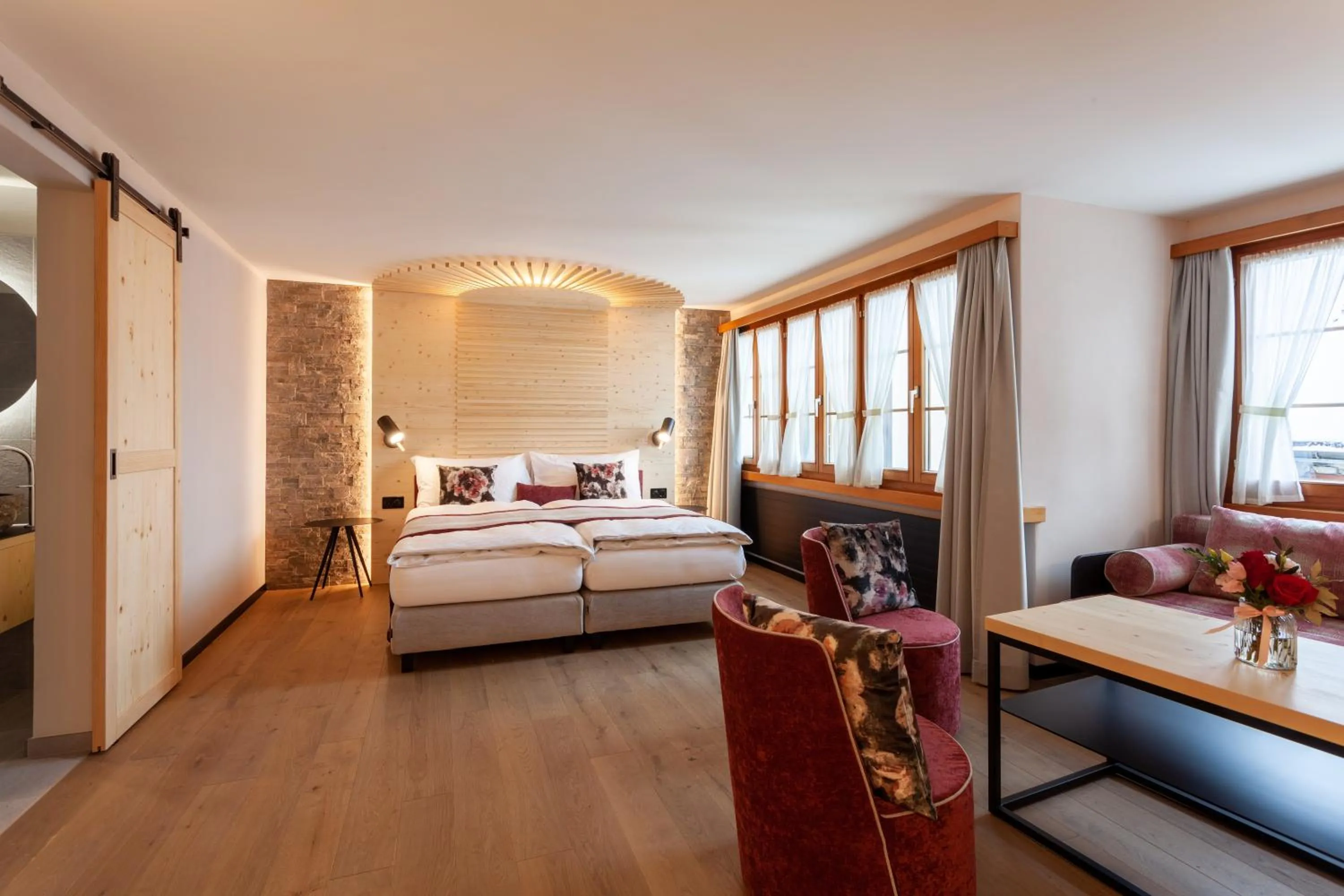 Photo of the whole room, Bed in Sonne Andermatt Swiss Quality Hotel