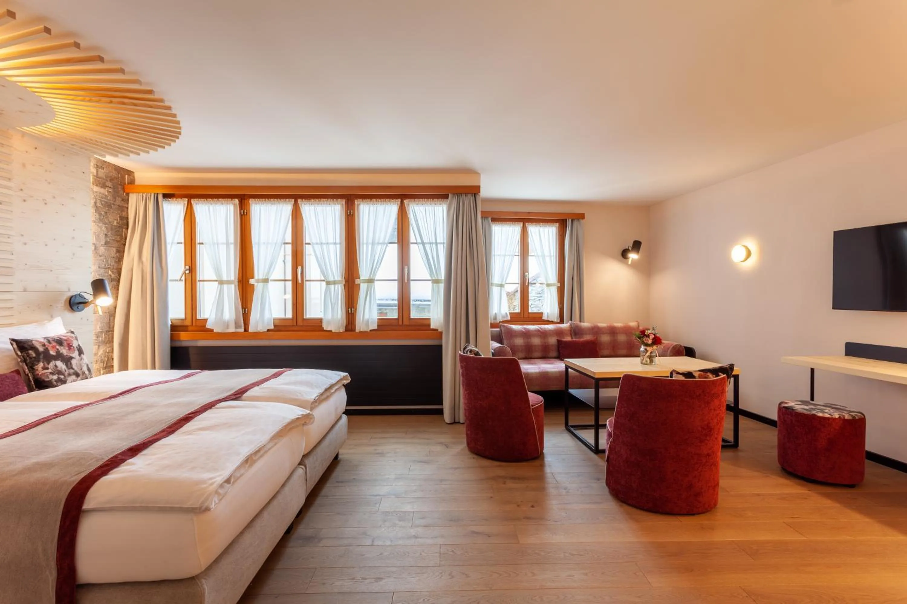 Photo of the whole room, Bed in Sonne Andermatt Swiss Quality Hotel
