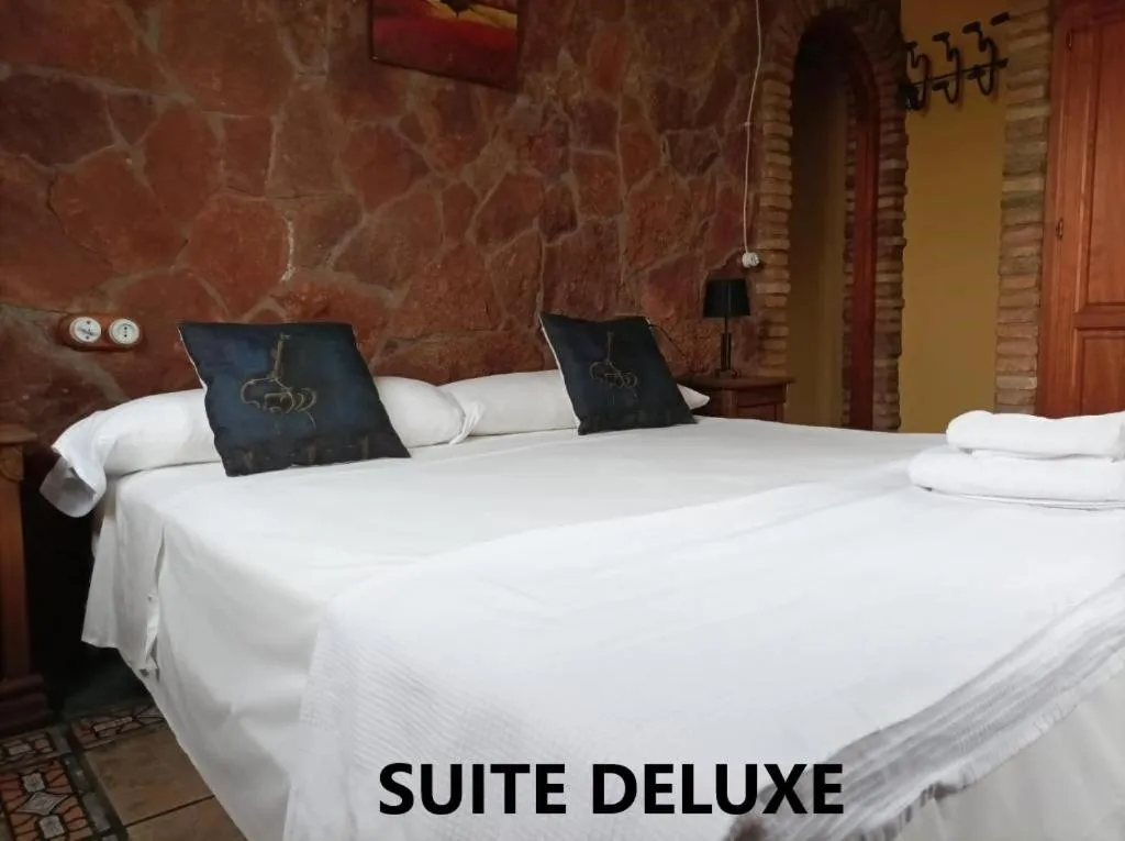 Bed in Alojamientos La Casa de Piedra