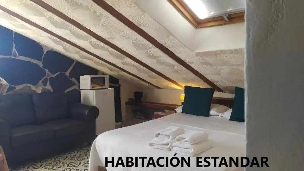 Bed in Alojamientos La Casa de Piedra