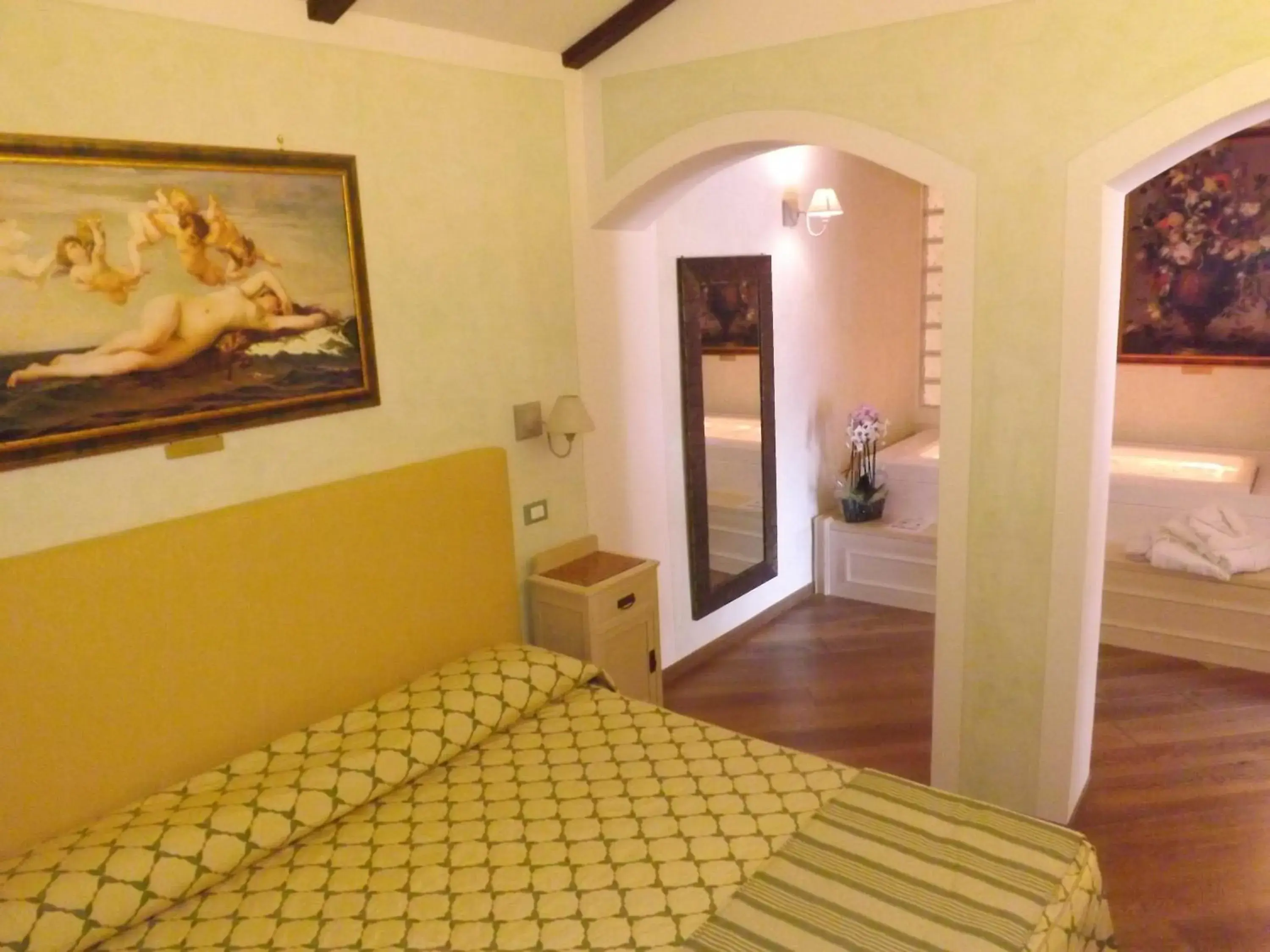 Decorative detail, Bed in Relais Il Postiglione - Antica Posta dei Chigi Decorative detail, Bed in Relais Il Postiglione - Antica Posta dei Chigi