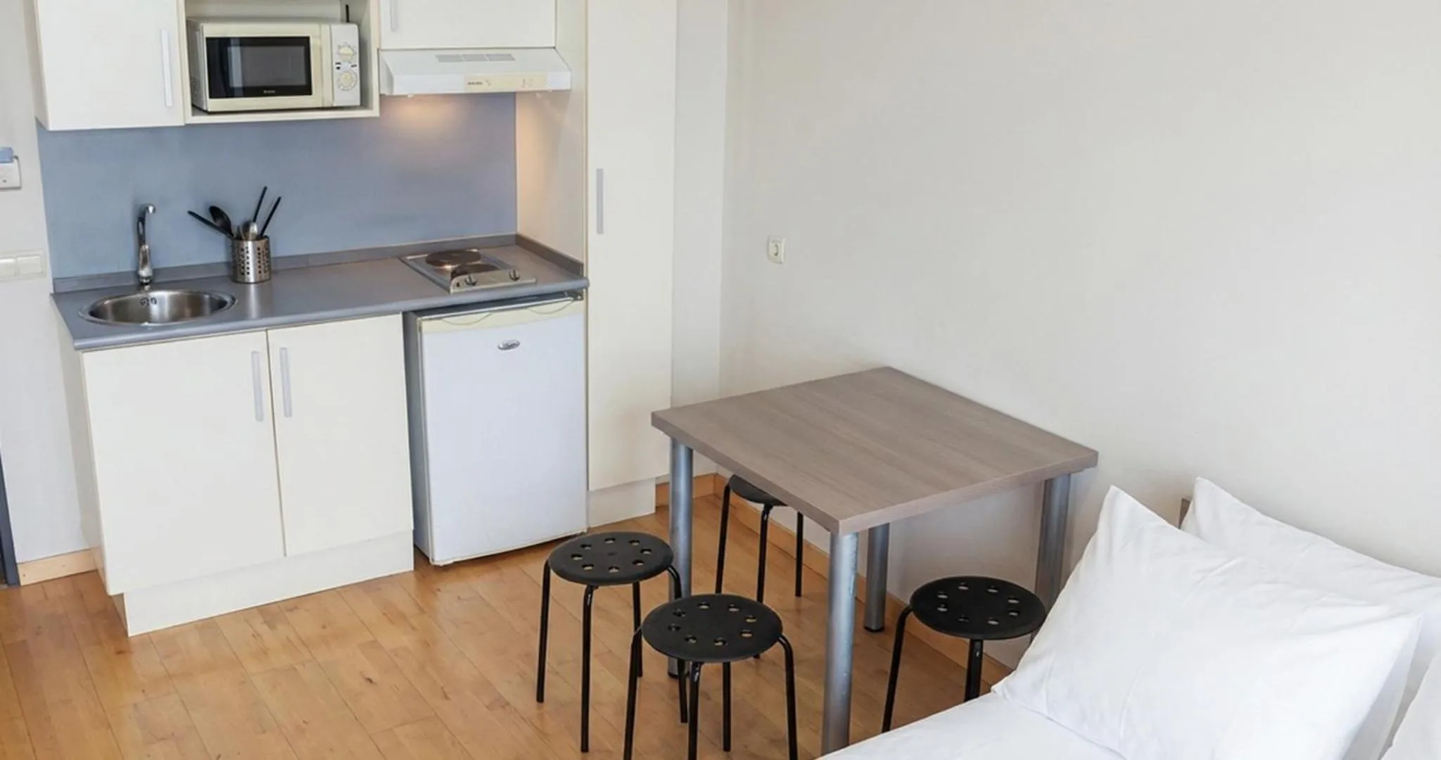 Kitchen or kitchenette in Vértice Roomspace