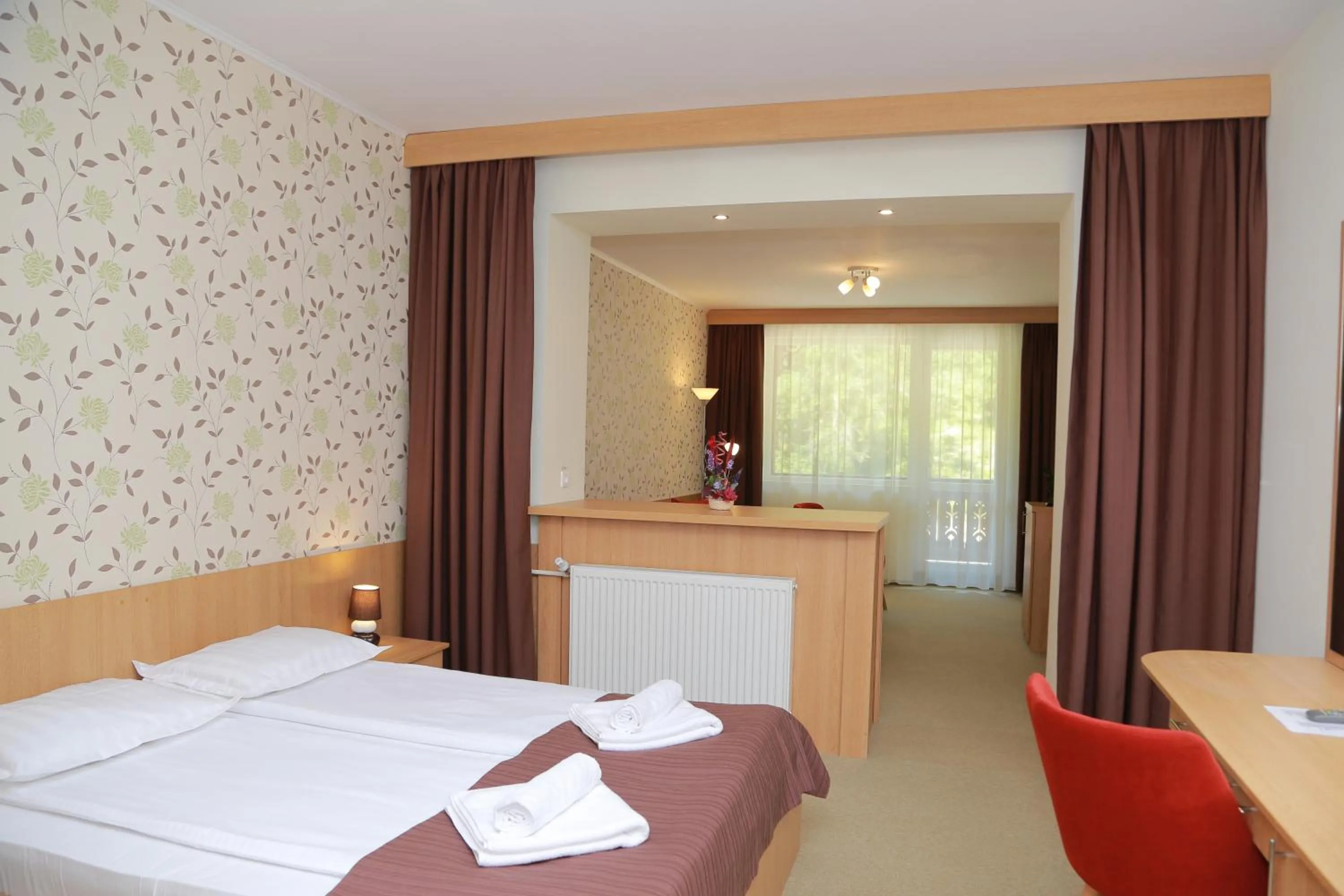 Bed in Hotel Muresul Health Spa