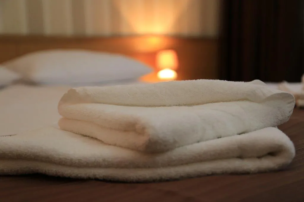 Bed in Hotel Muresul Health Spa