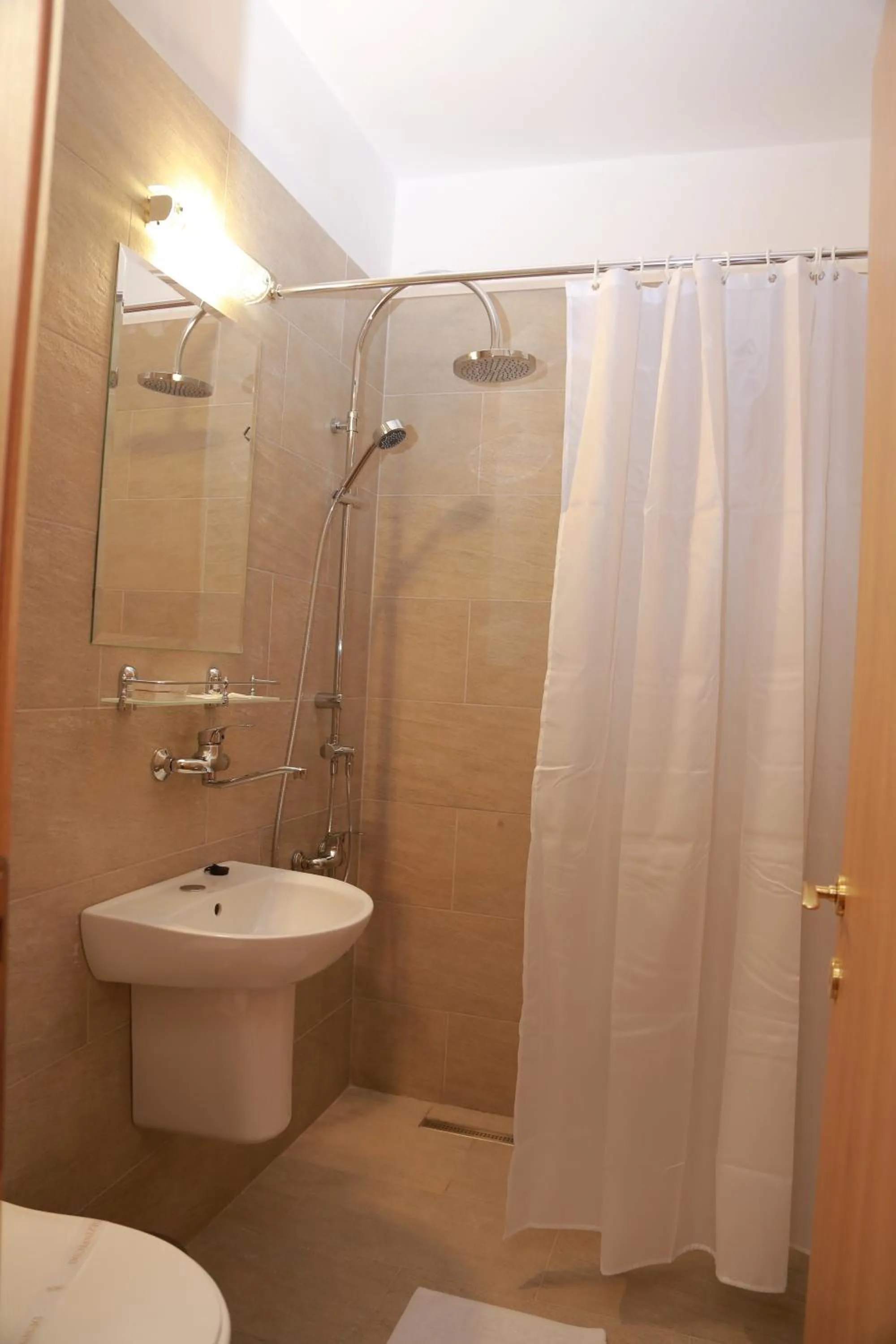 Bathroom in Hotel Muresul Health Spa