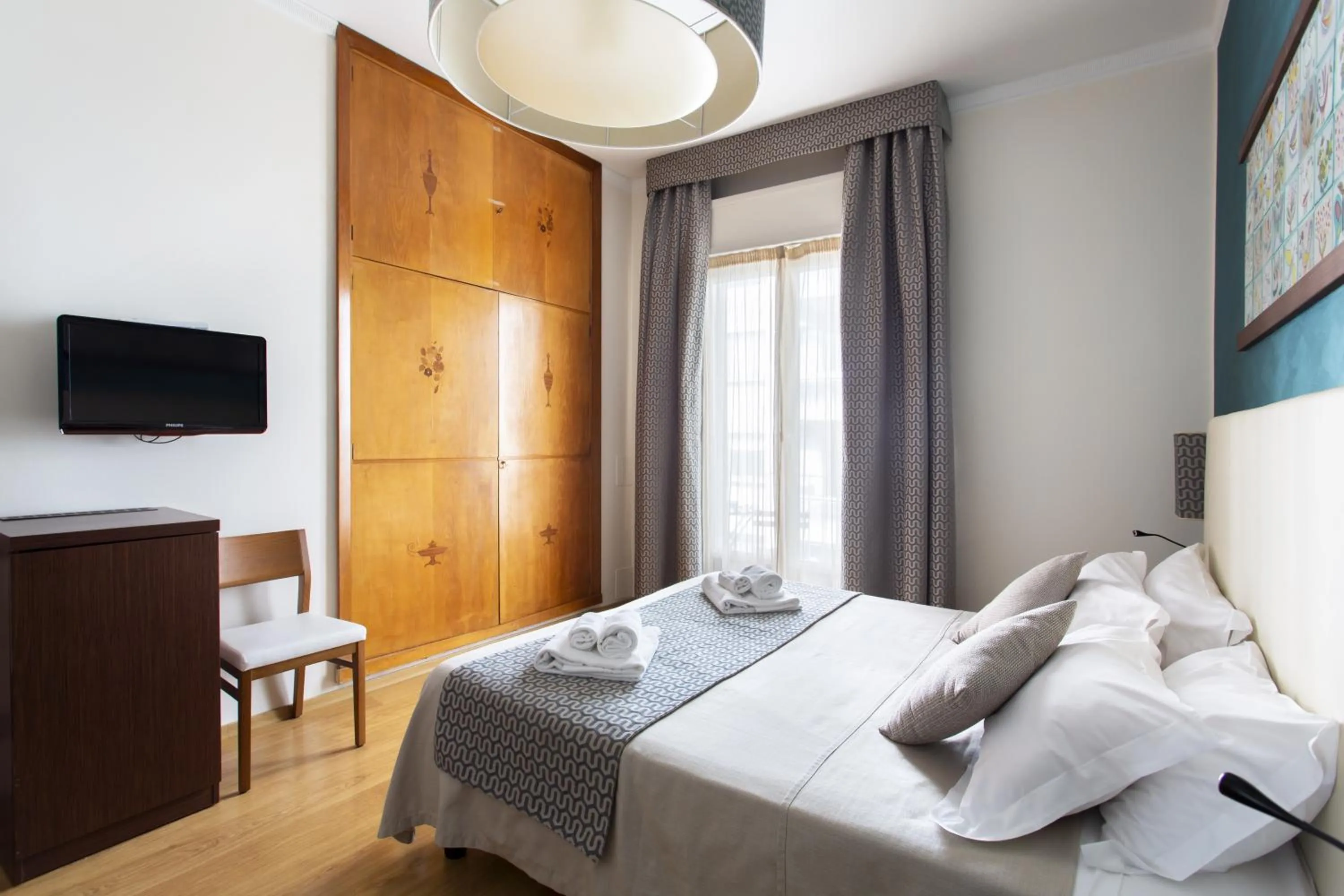 Photo of the whole room, Bed in Residenza Wagner