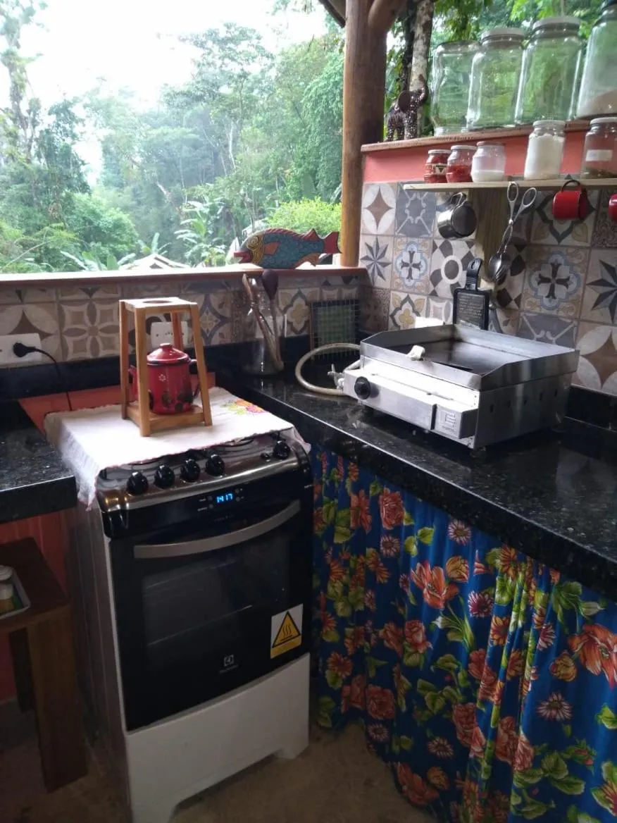 Kitchen or kitchenette in Eco Chalés Caminho das Águas