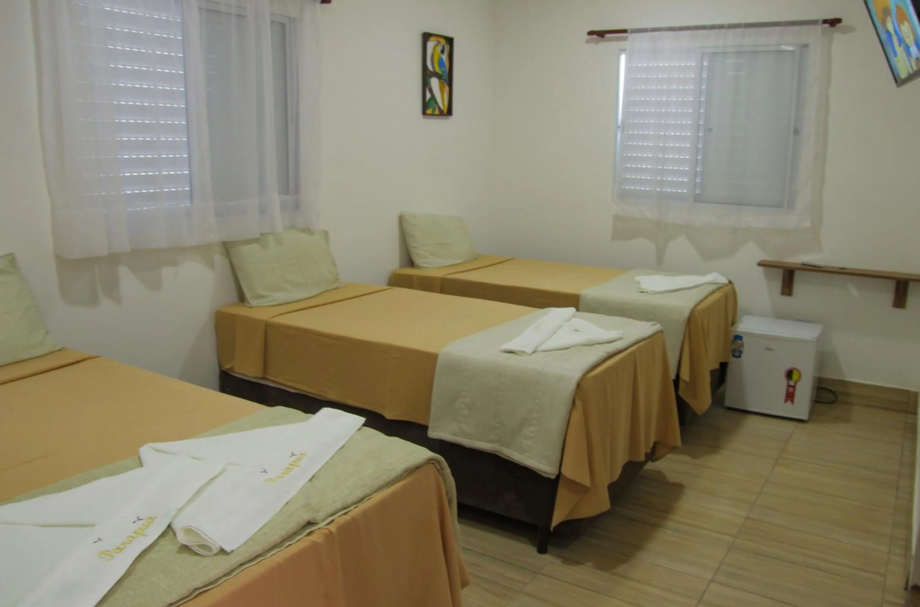 Bed in Pousada Parapuã