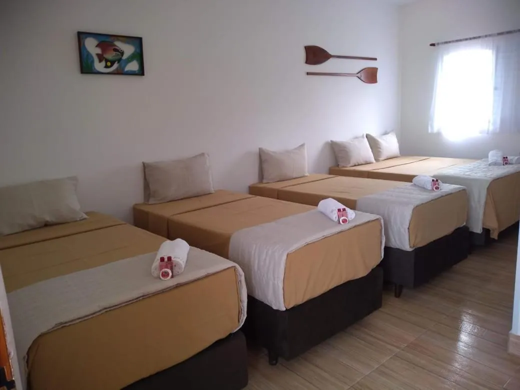 Bed in Pousada Parapuã